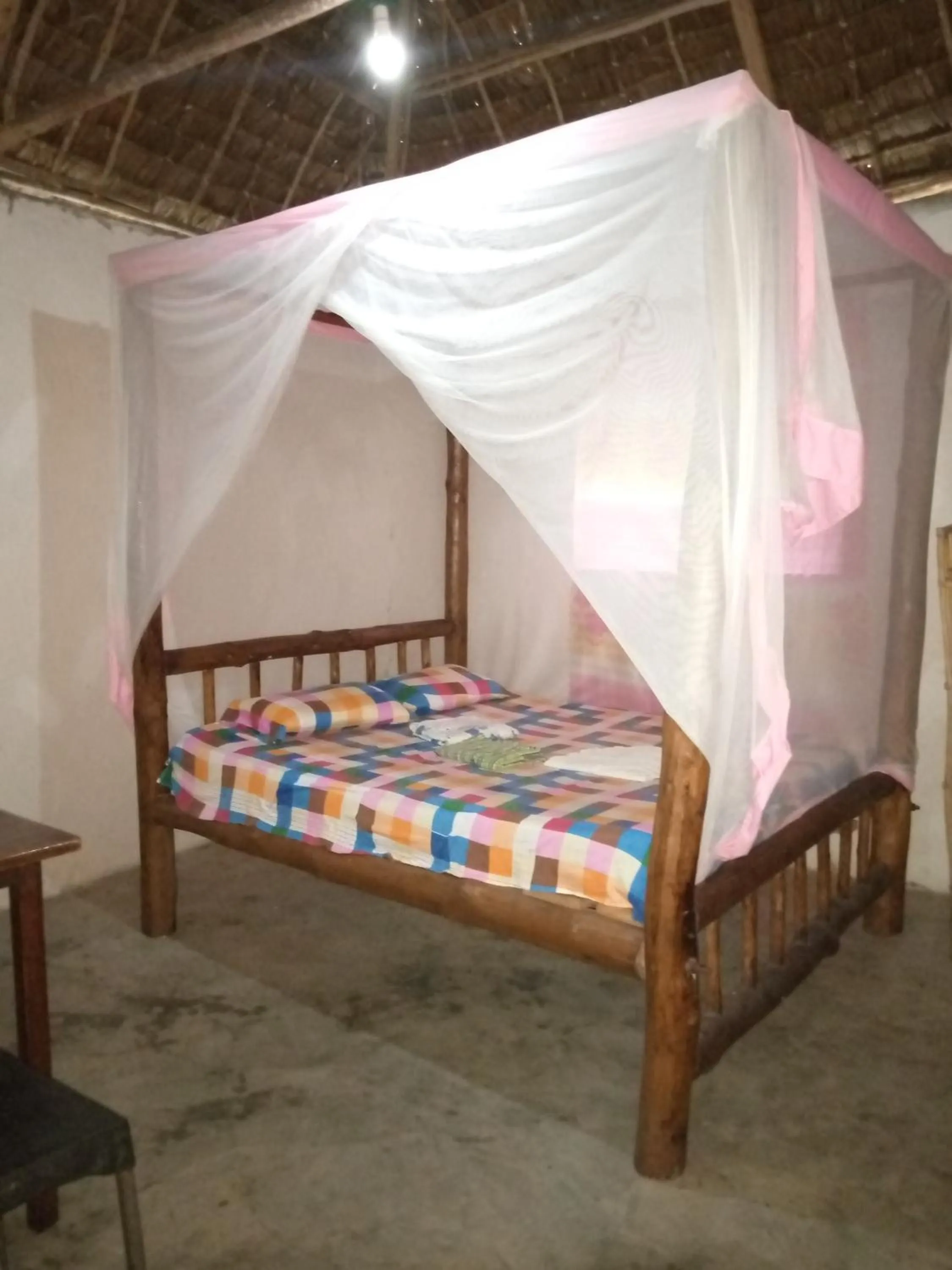 Bed in Mida Creek Eco Camp
