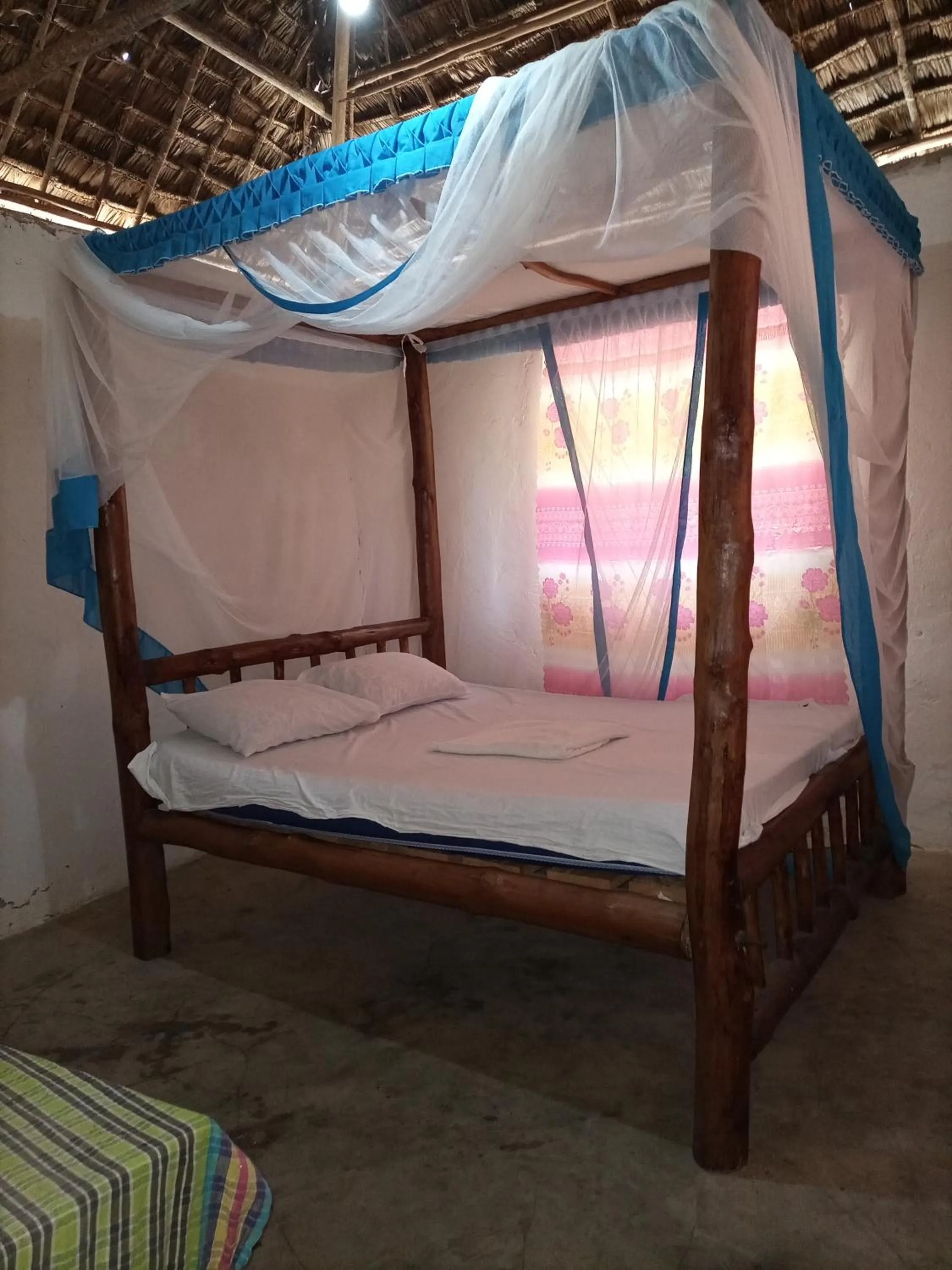 Bed in Mida Creek Eco Camp