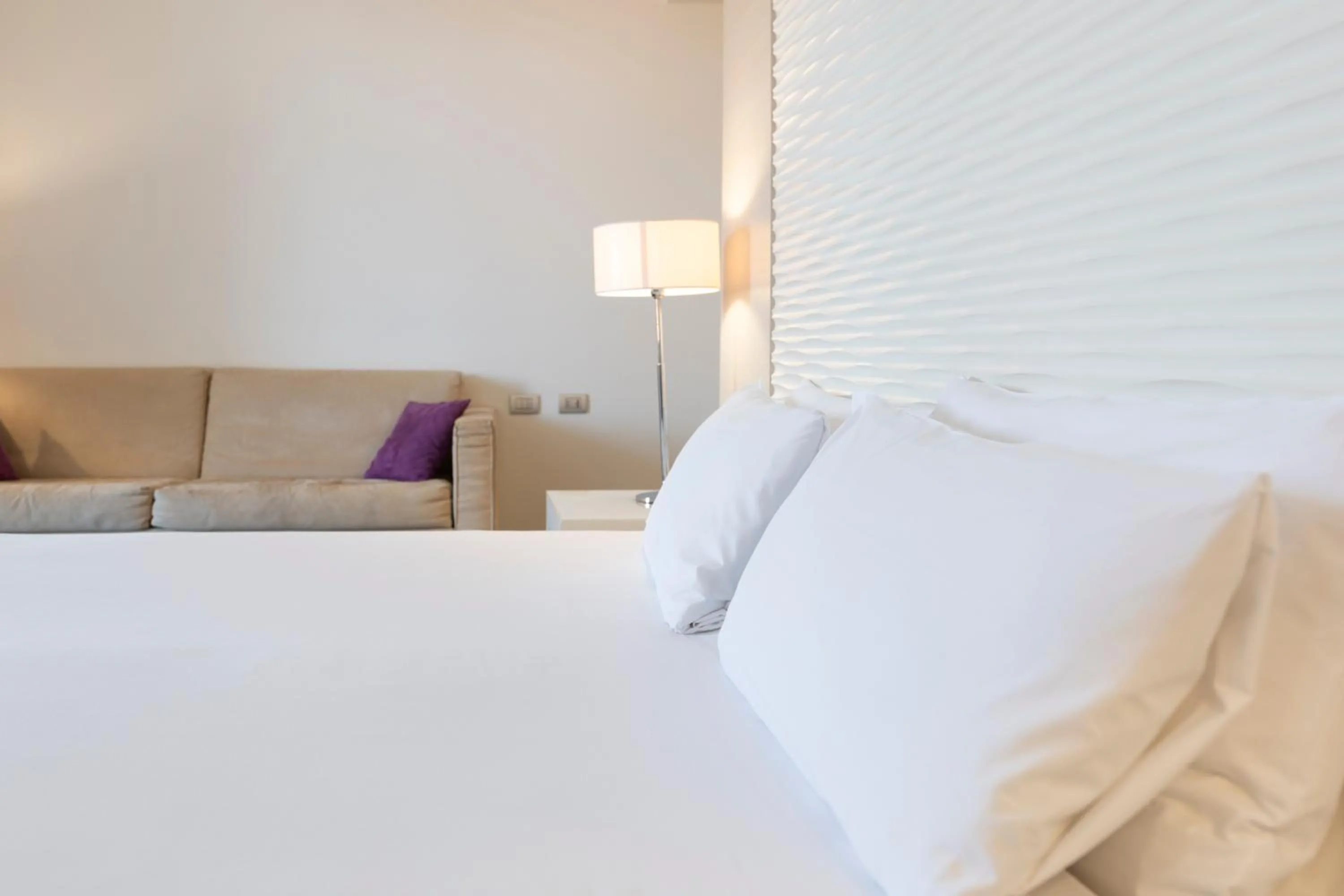 Bed in Laguna Palace Hotel Grado