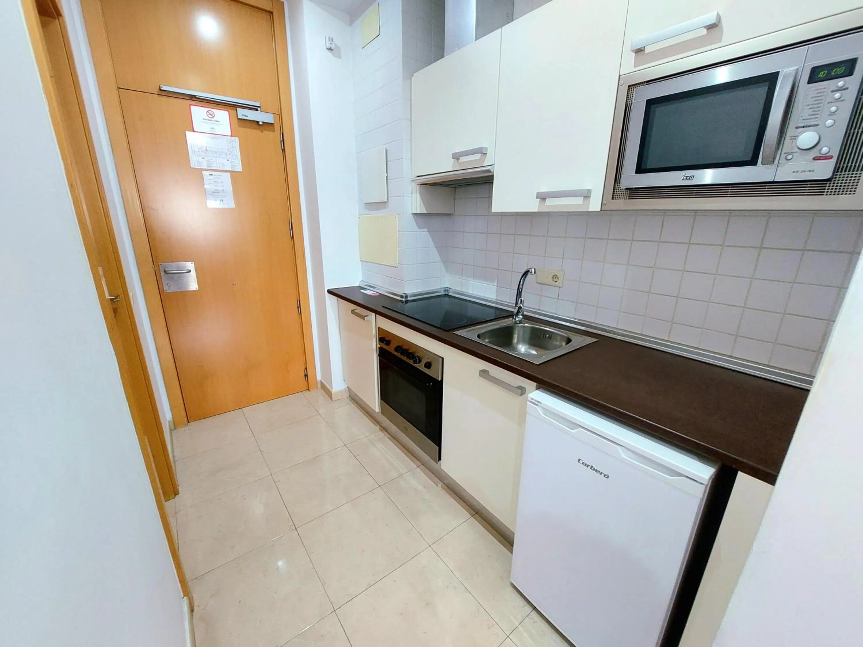 Kitchen or kitchenette in Domocenter Apartamentos Turísticos