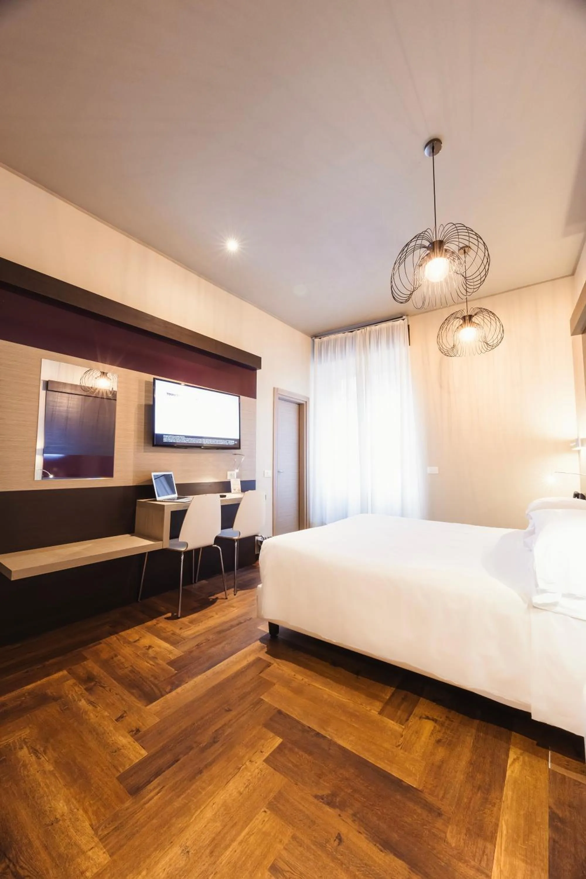 Bed in Genius Hotel Downtown