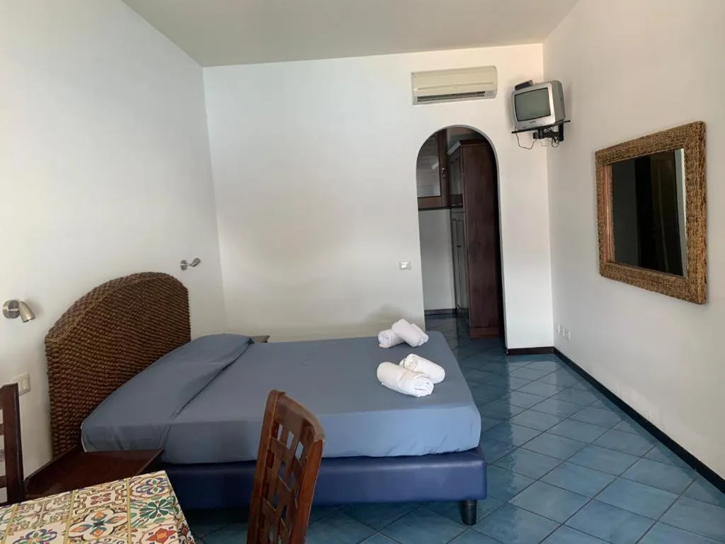 Bed in Oltremare Residence Hotel