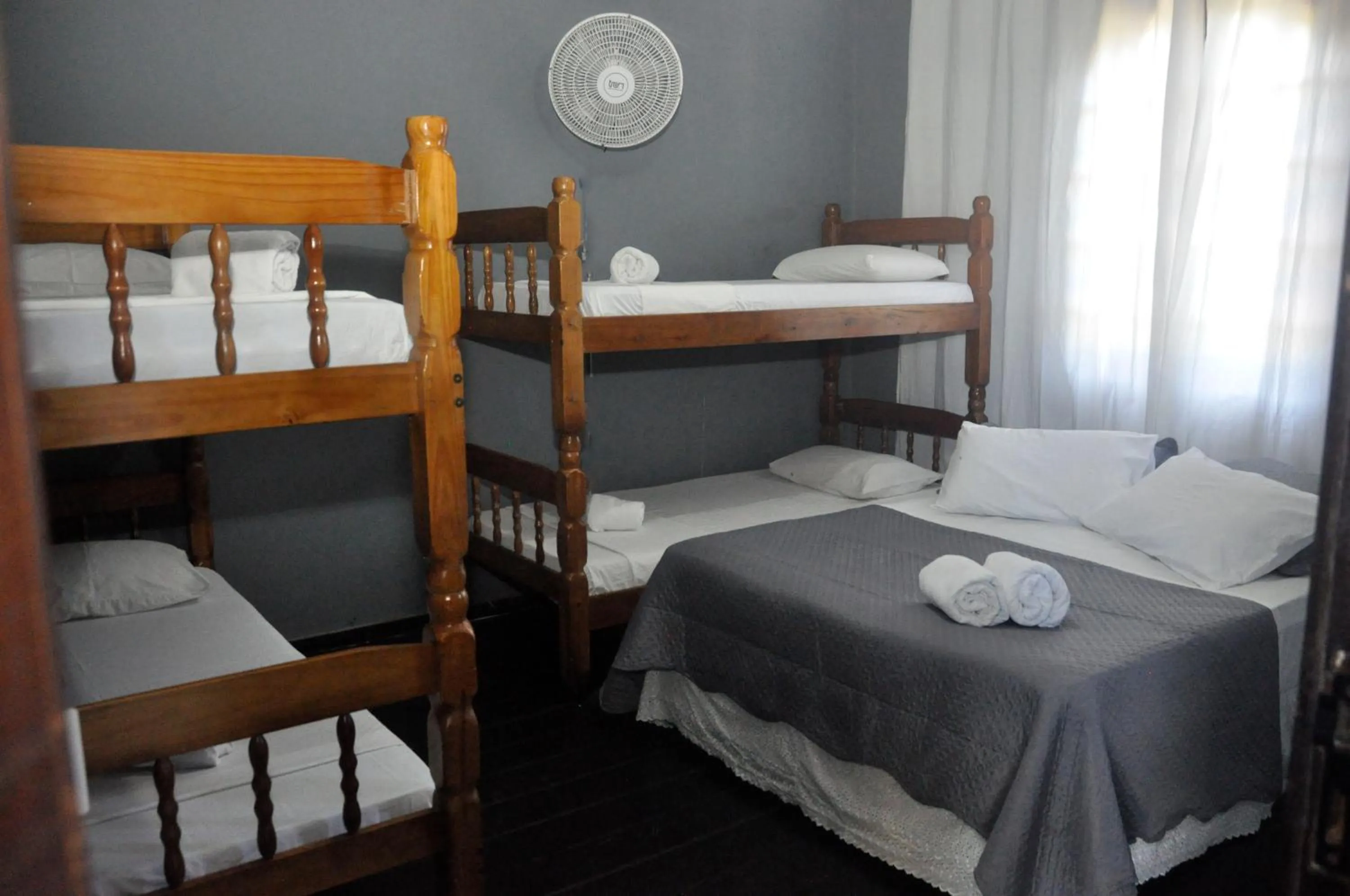 Bed in Pousada My House Cabo Frio