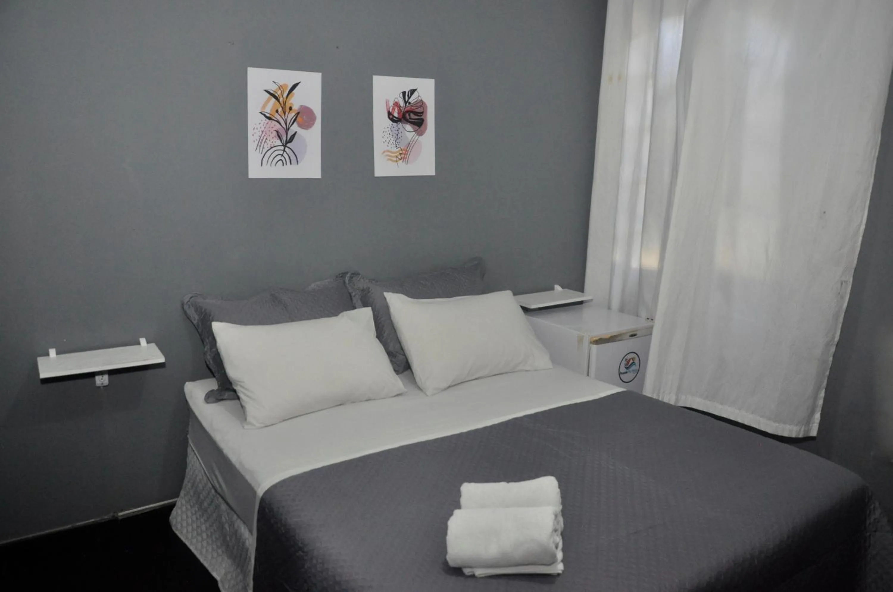 Bed in Pousada My House Cabo Frio