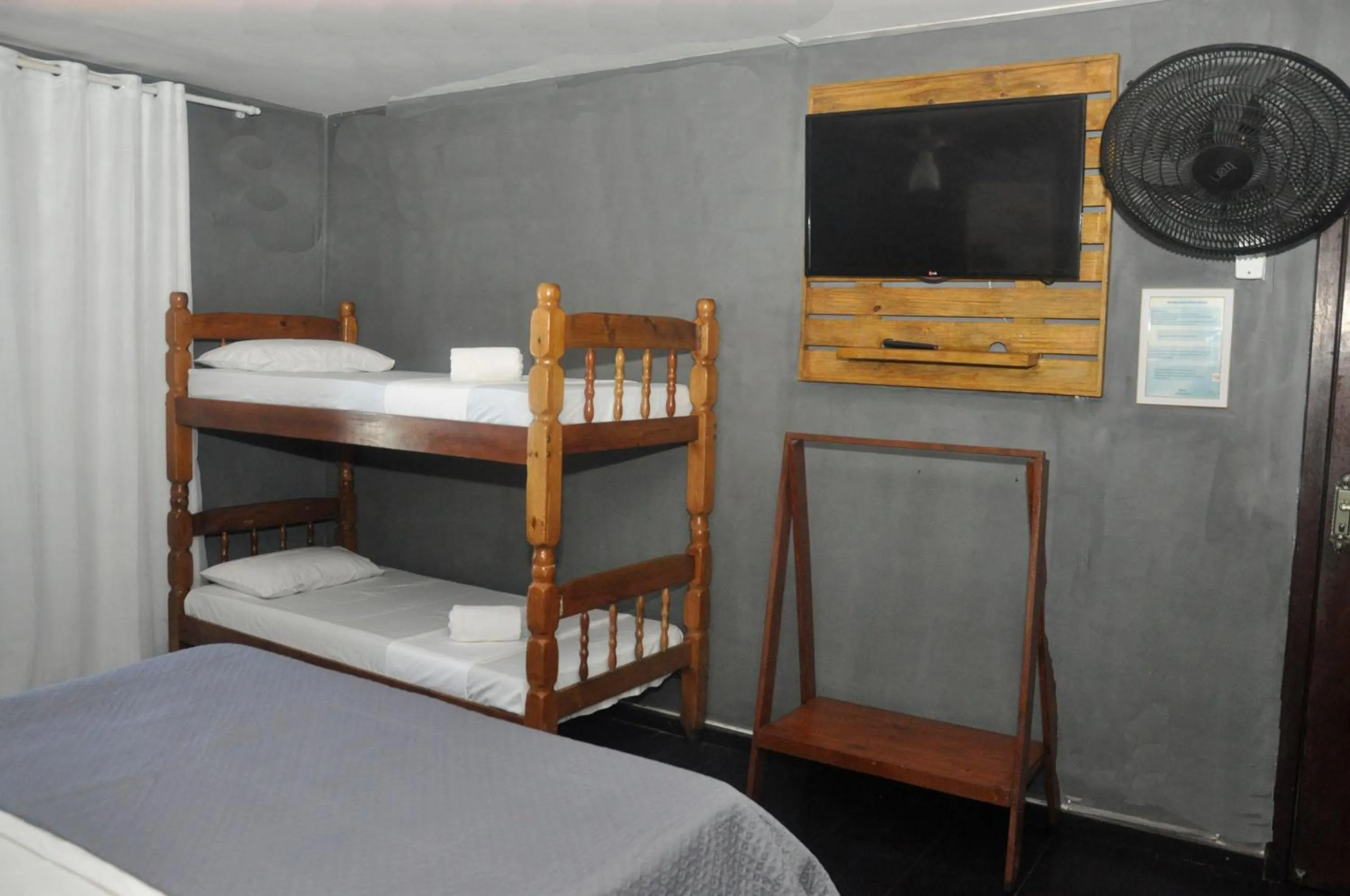 Bed in Pousada My House Cabo Frio