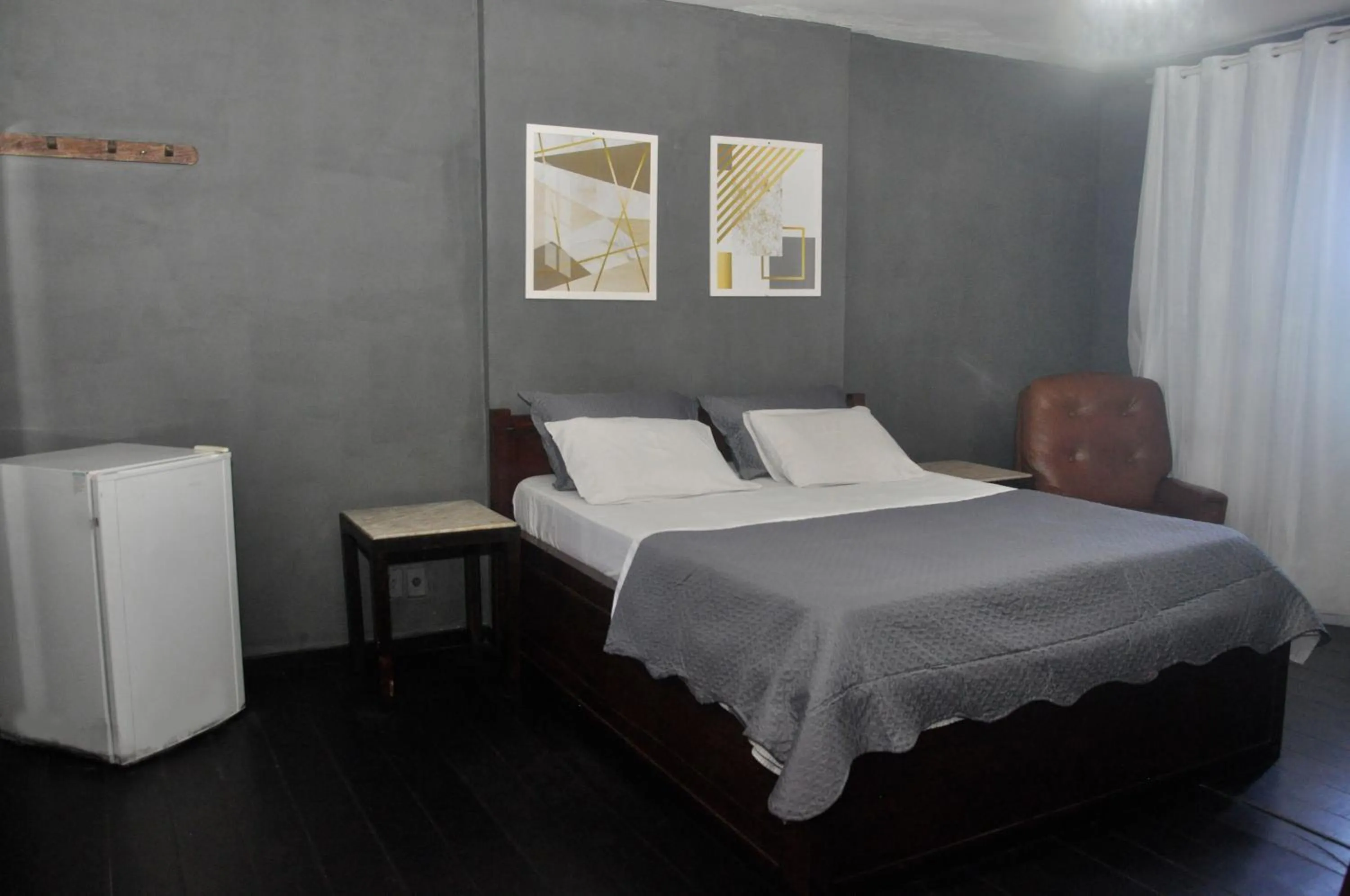 Bed in Pousada My House Cabo Frio