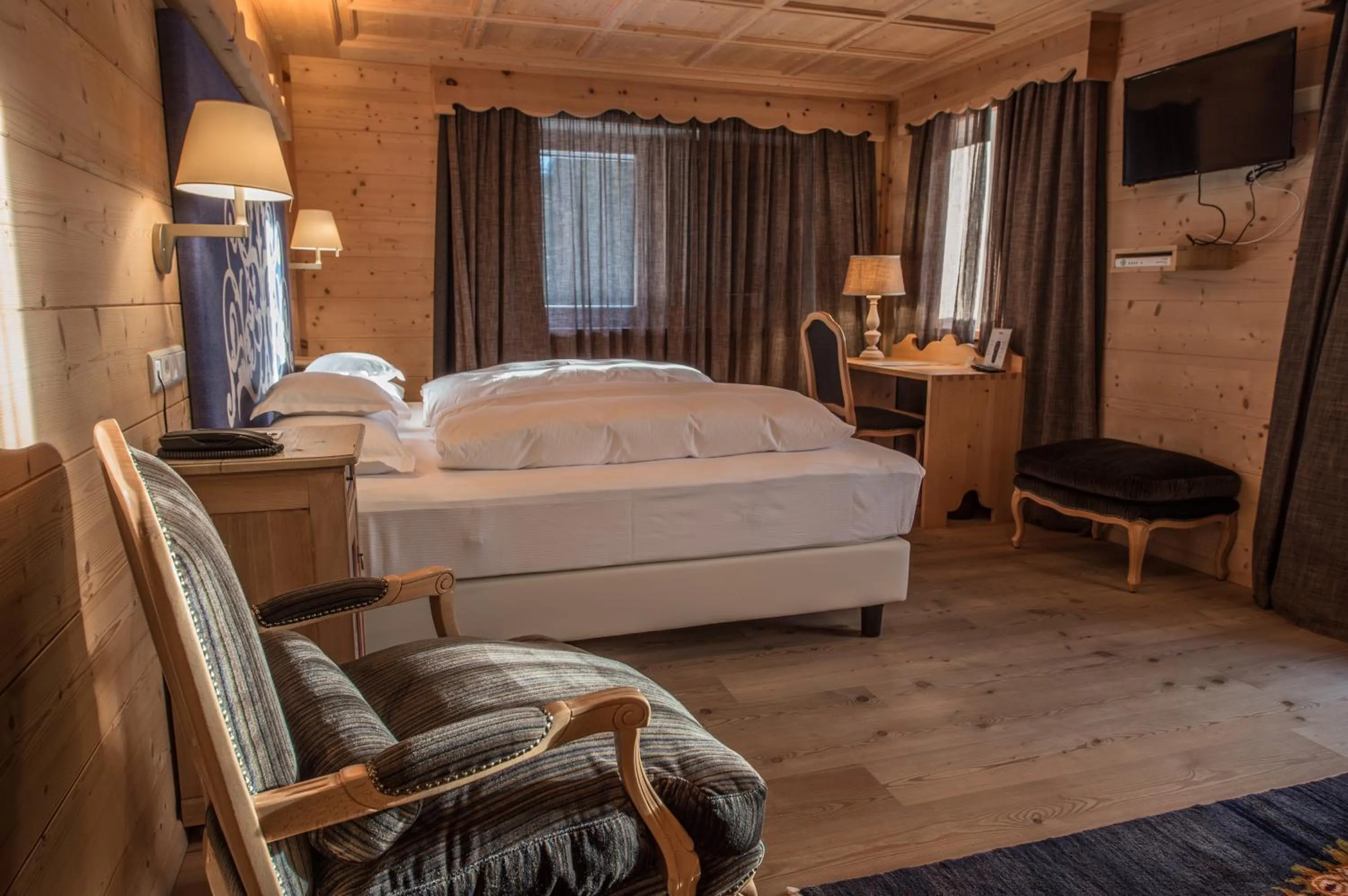 Bed in Hotel Ciasa Salares