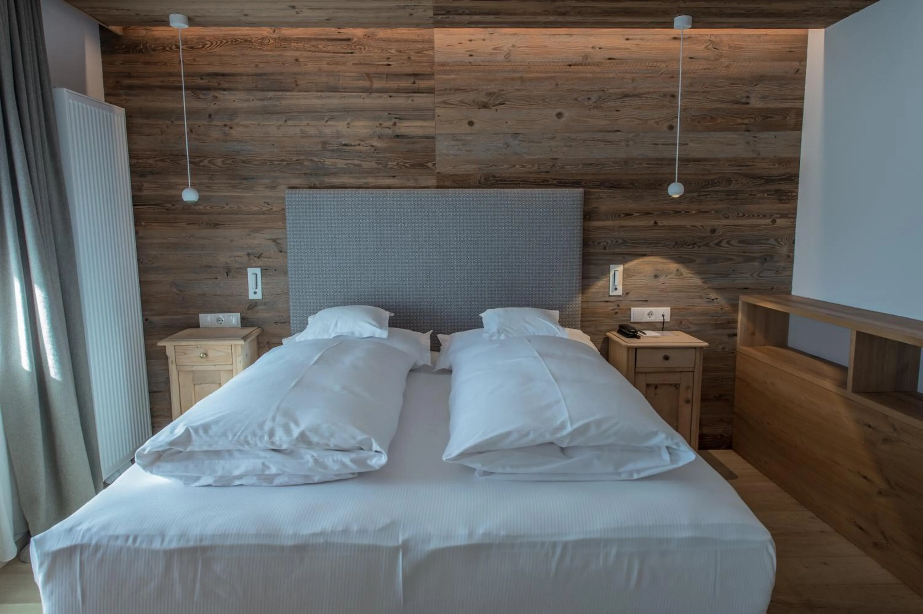 Bed in Hotel Ciasa Salares