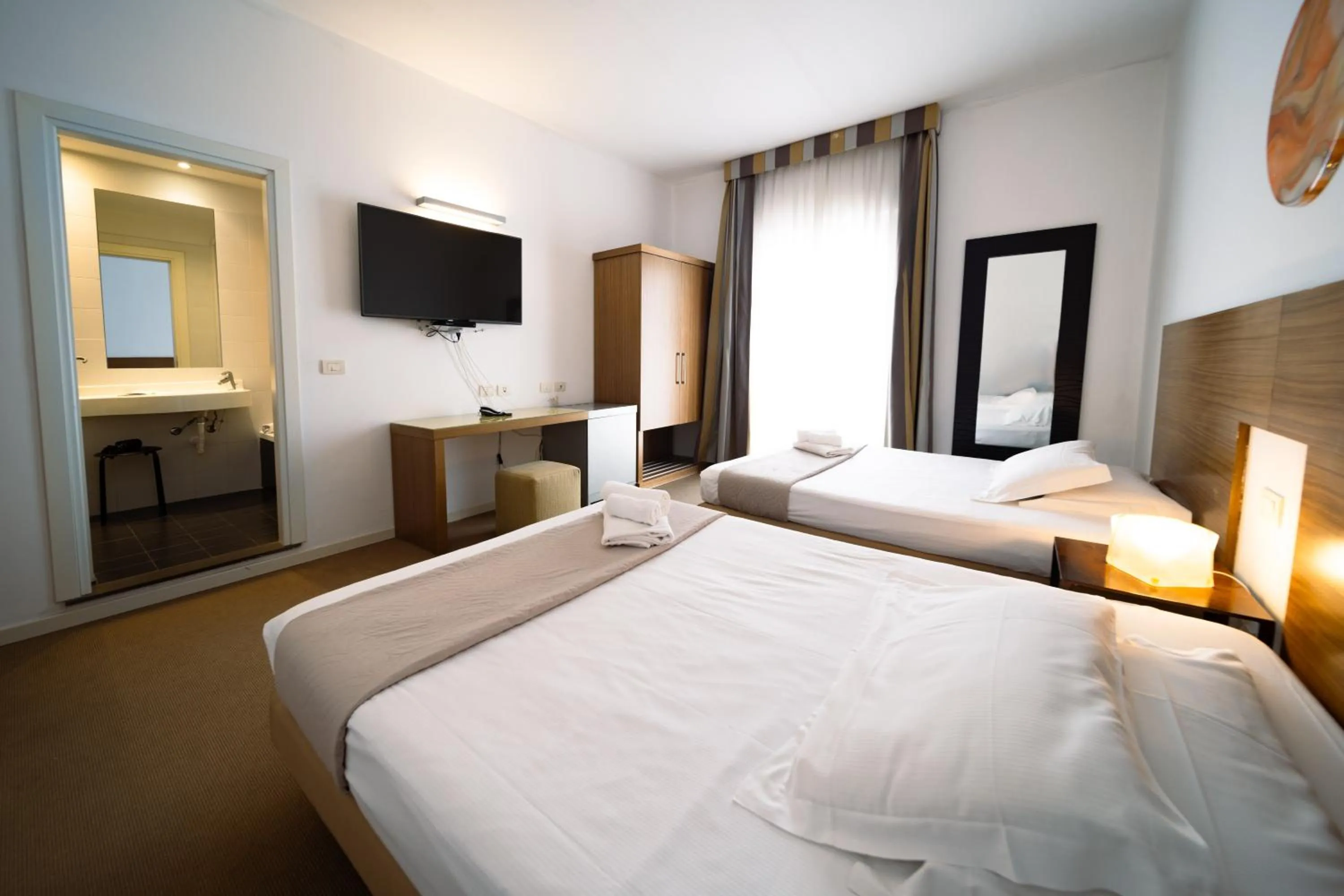 Photo of the whole room, Bed in Hotel Trieste