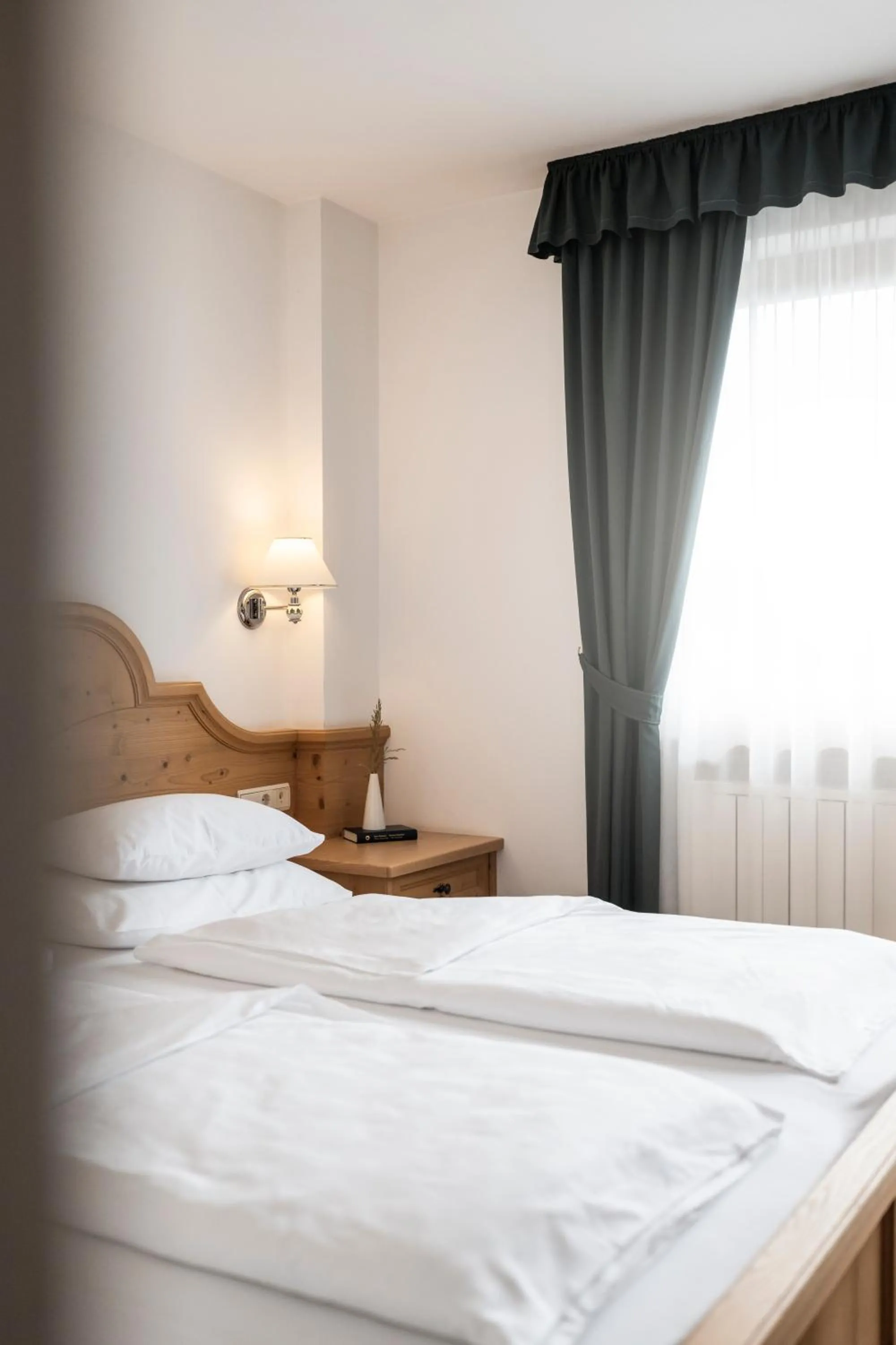 Bed in Naturhotel Miraval