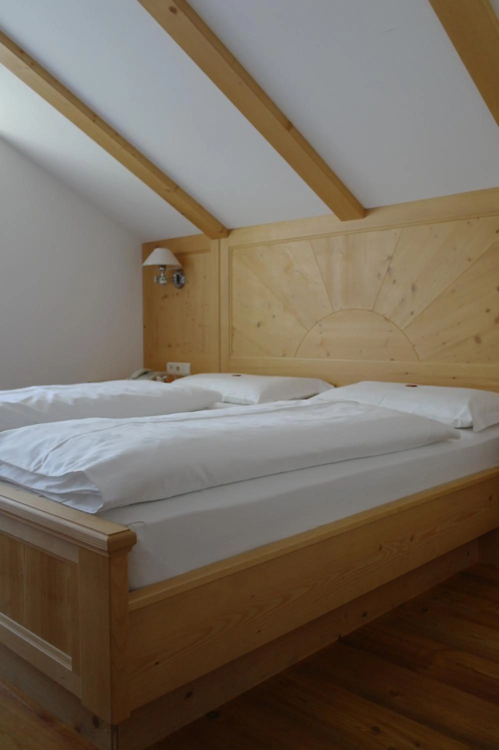 Bed in Naturhotel Miraval