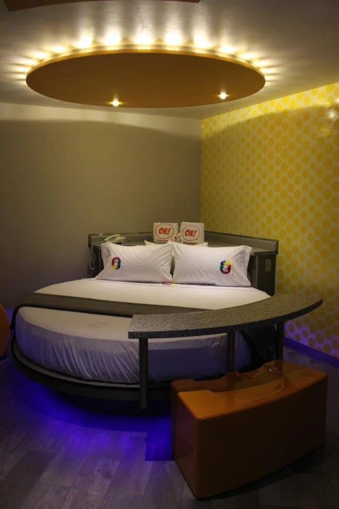 Bed in Oh! Oriente Hotel