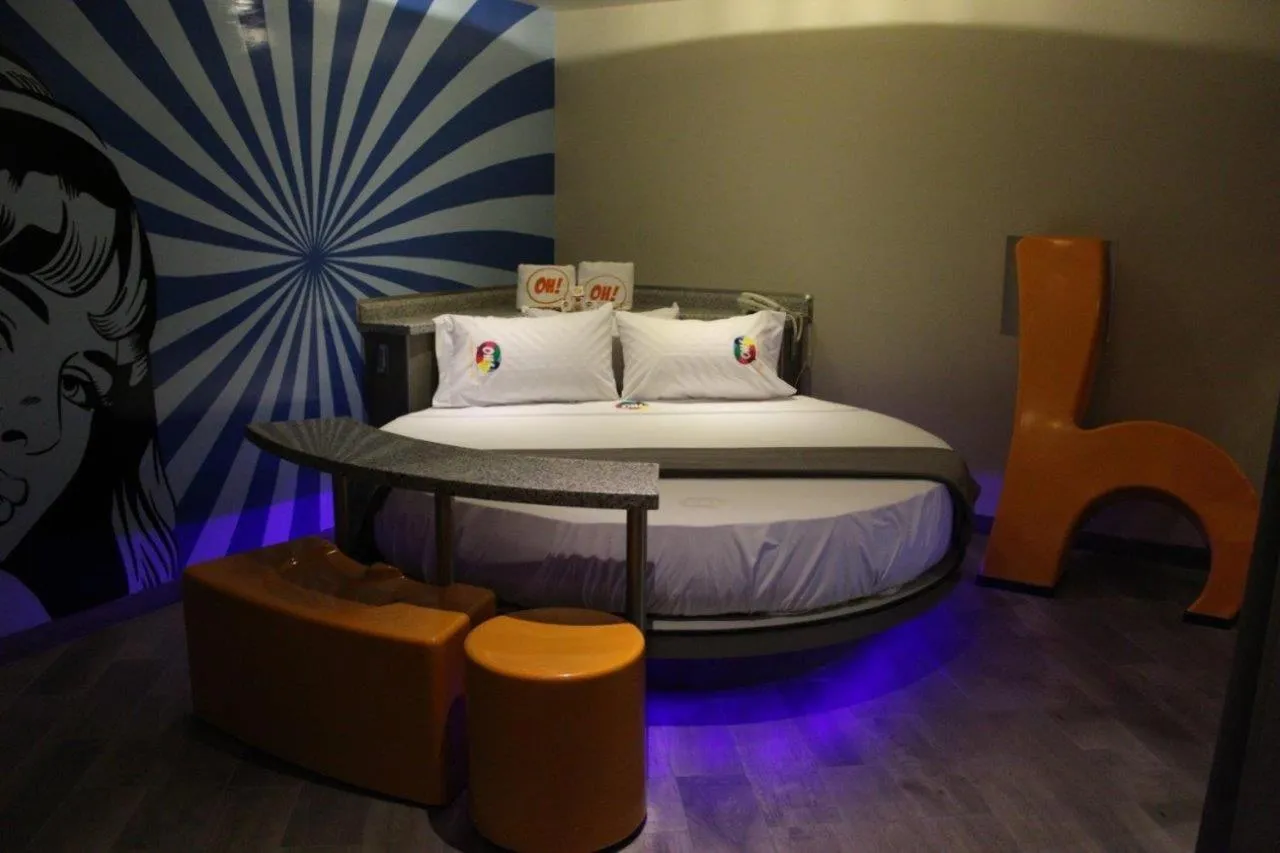 Bed in Oh! Oriente Hotel