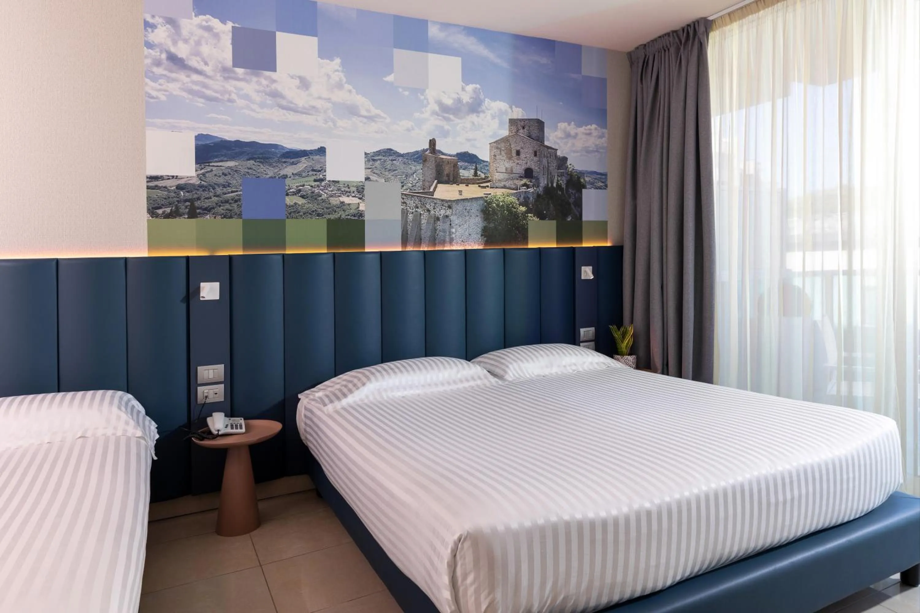 Bed in Mercure Hotel Rimini Artis