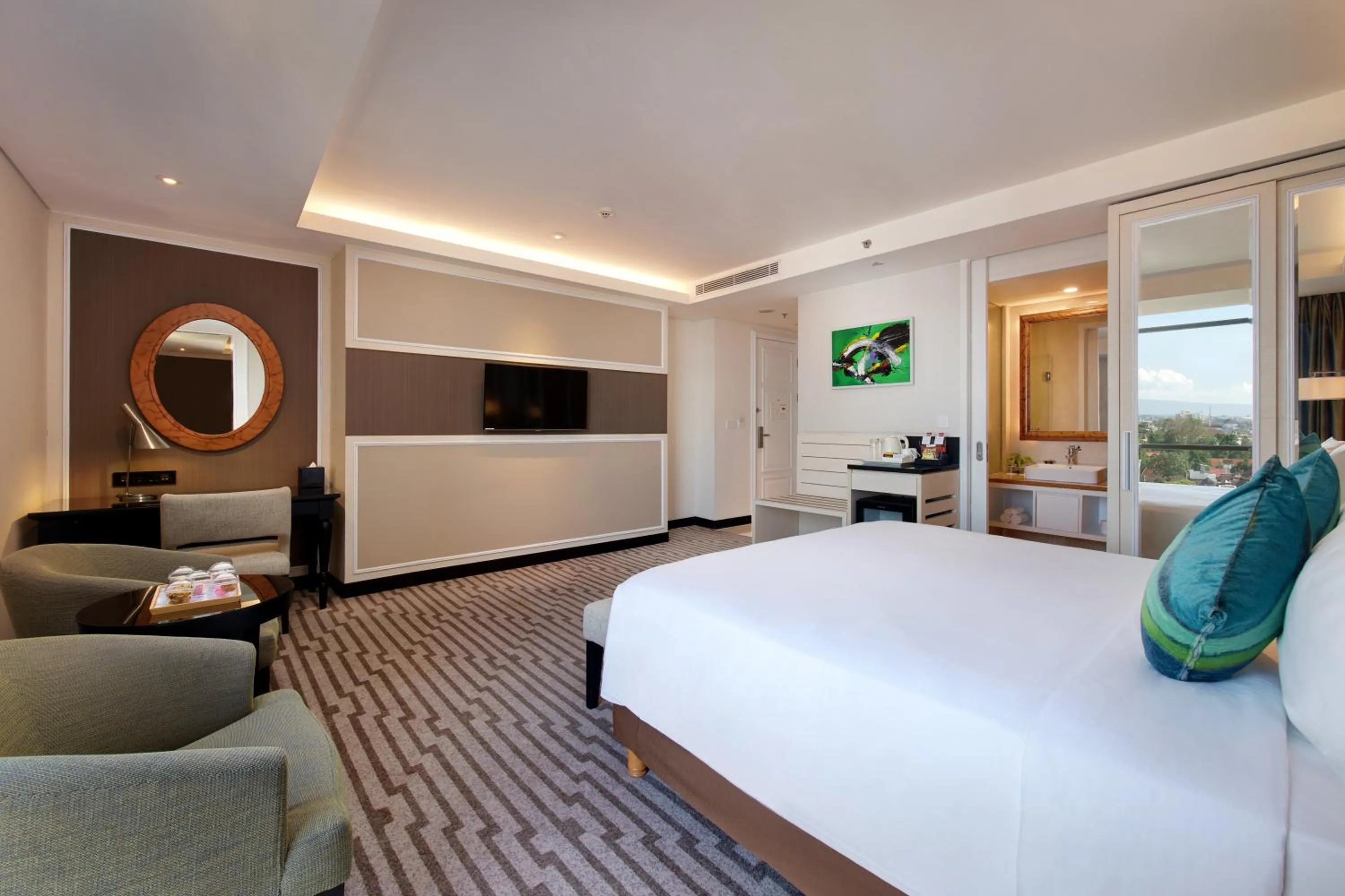 TV and multimedia, Bed in Swiss-Belboutique Yogyakarta