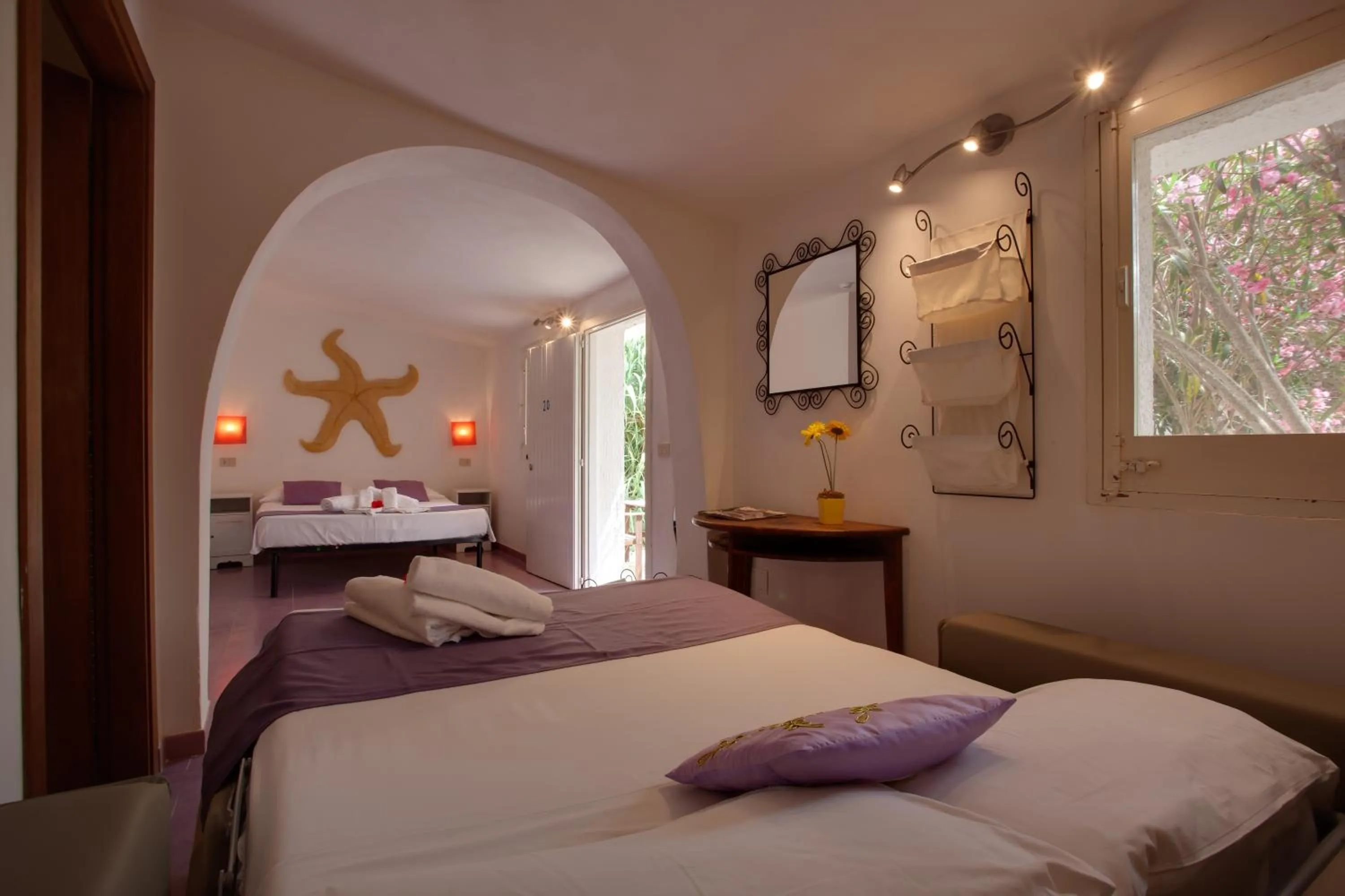 Photo of the whole room, Bed in L'Oasi Villaggio Albergo