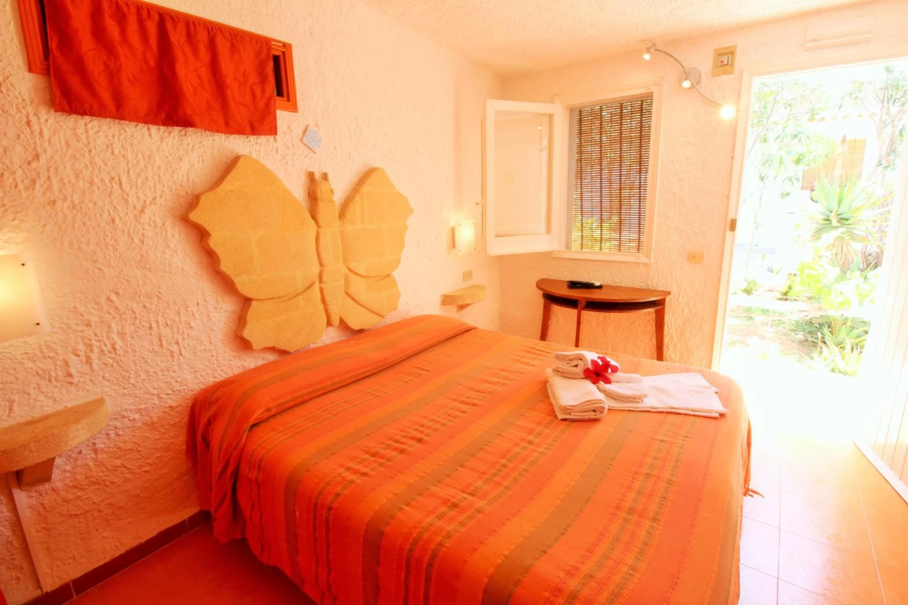 Photo of the whole room, Bed in L'Oasi Villaggio Albergo