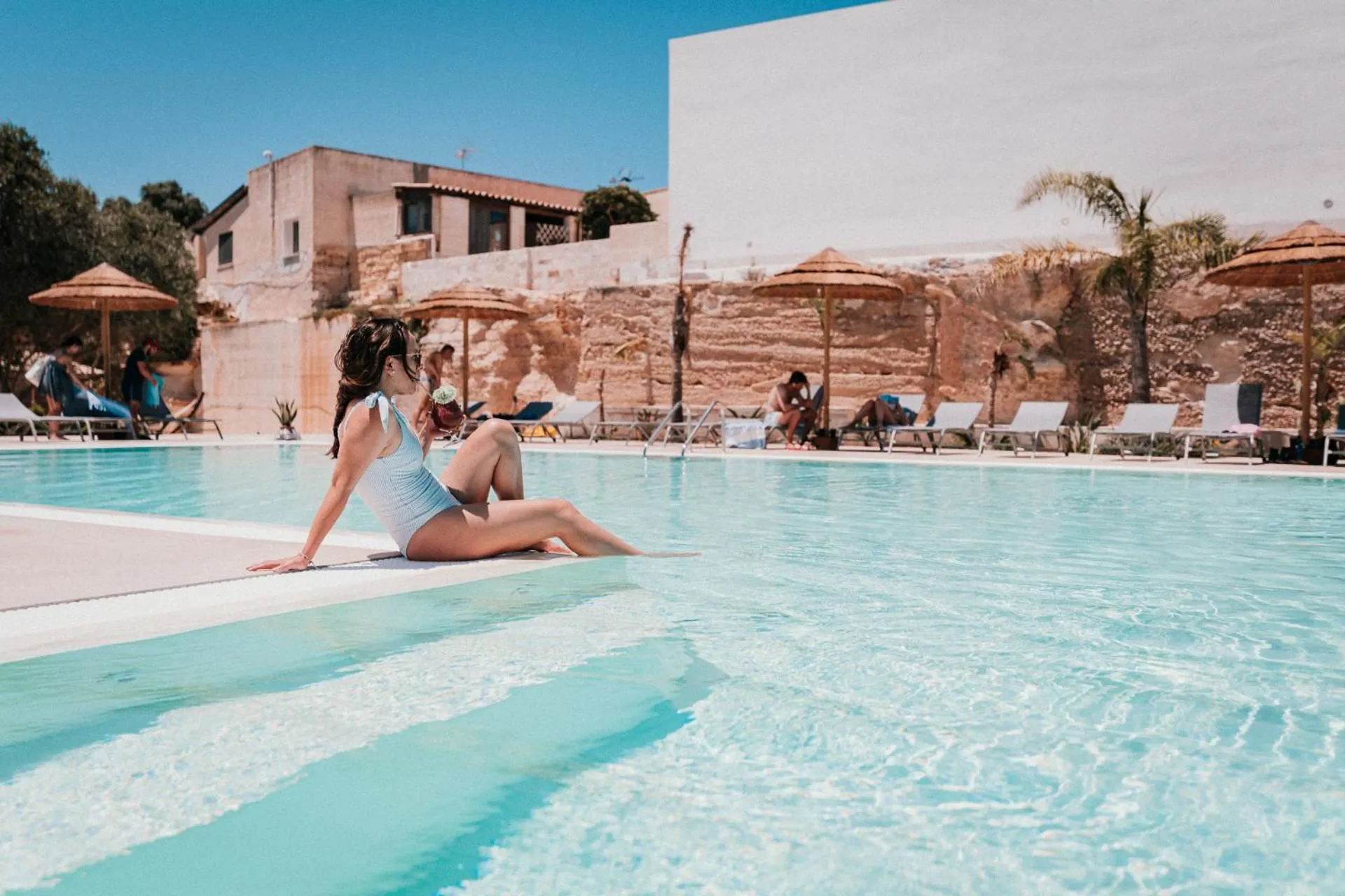Swimming pool in L'Oasi Villaggio Albergo