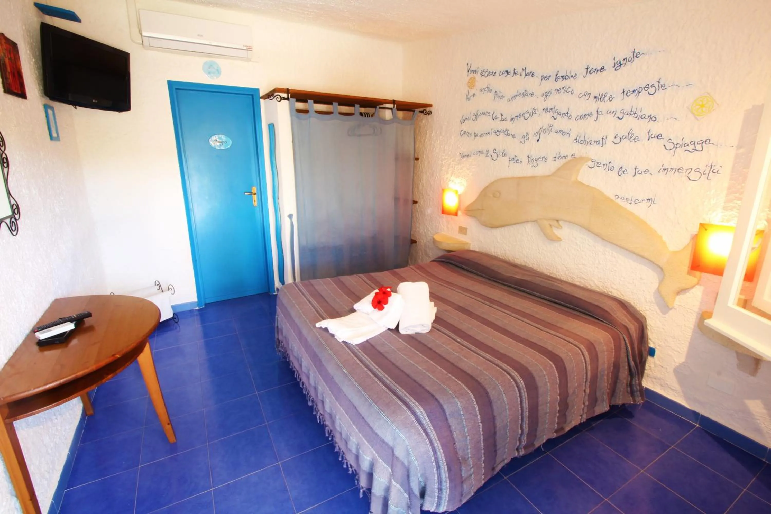 Photo of the whole room, Bed in L'Oasi Villaggio Albergo