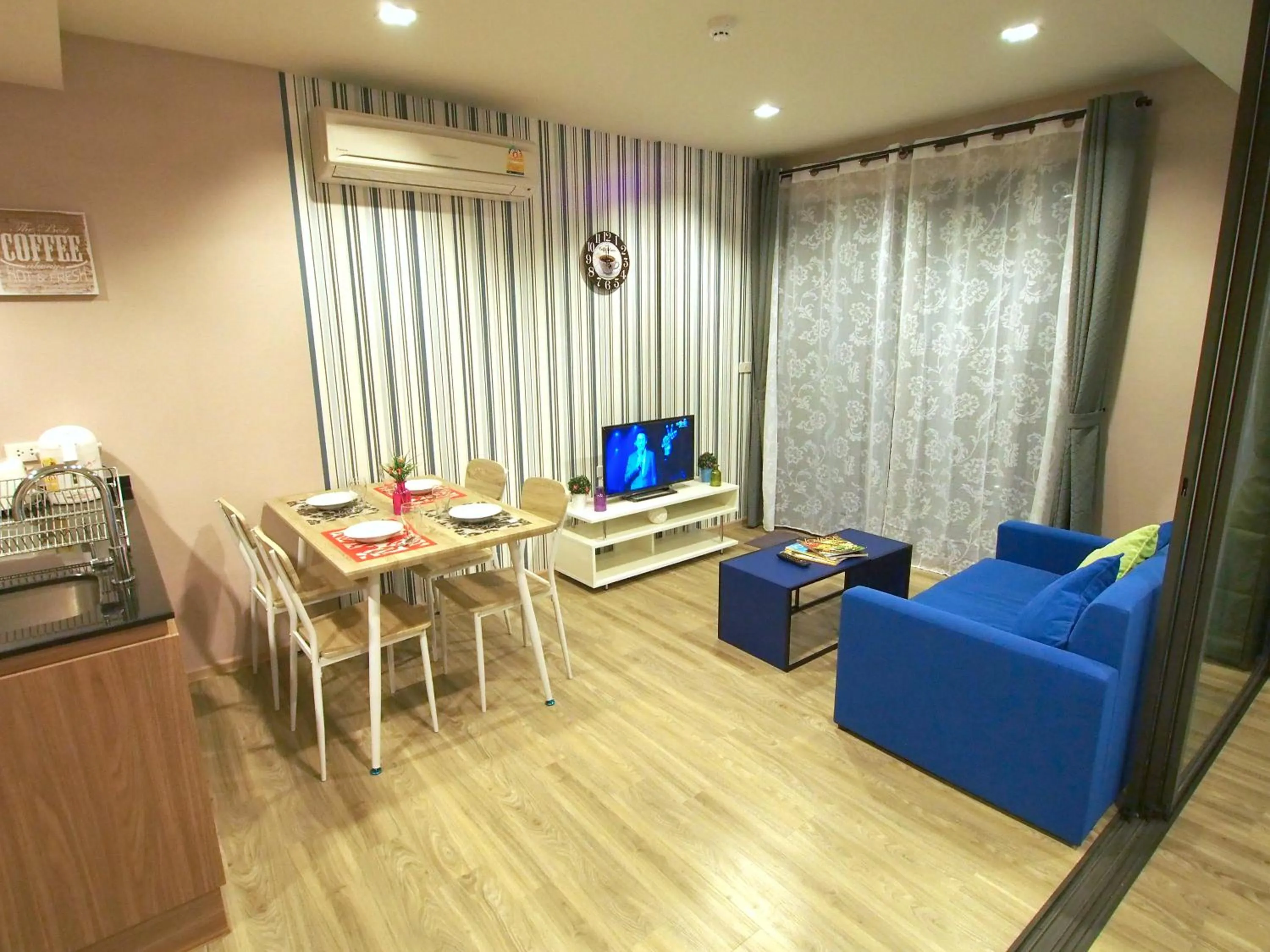 Living room in Rain by Lazy Sea Beach House