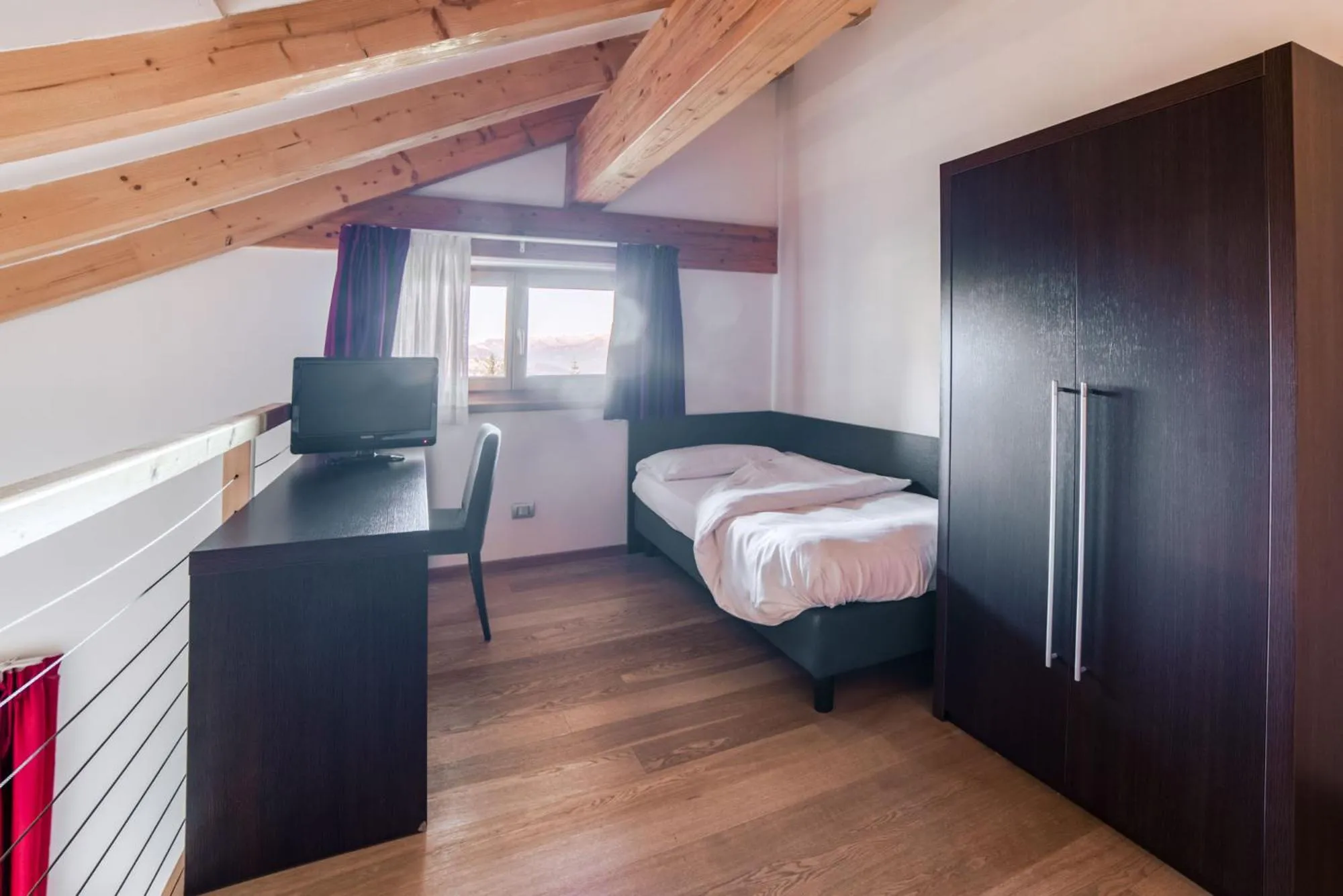 Bed in Hotel Montana