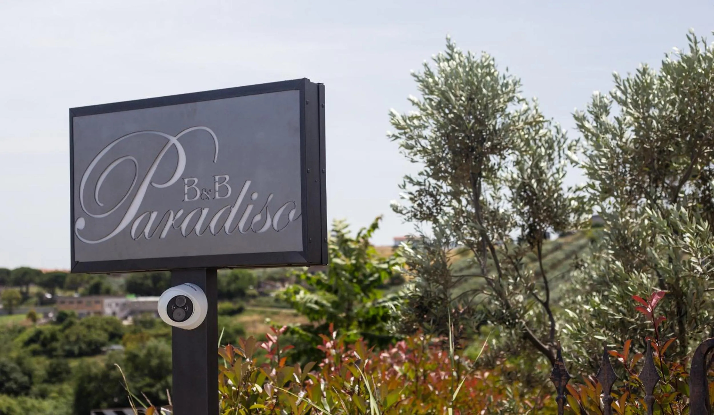 Property logo or sign in B&B Paradiso