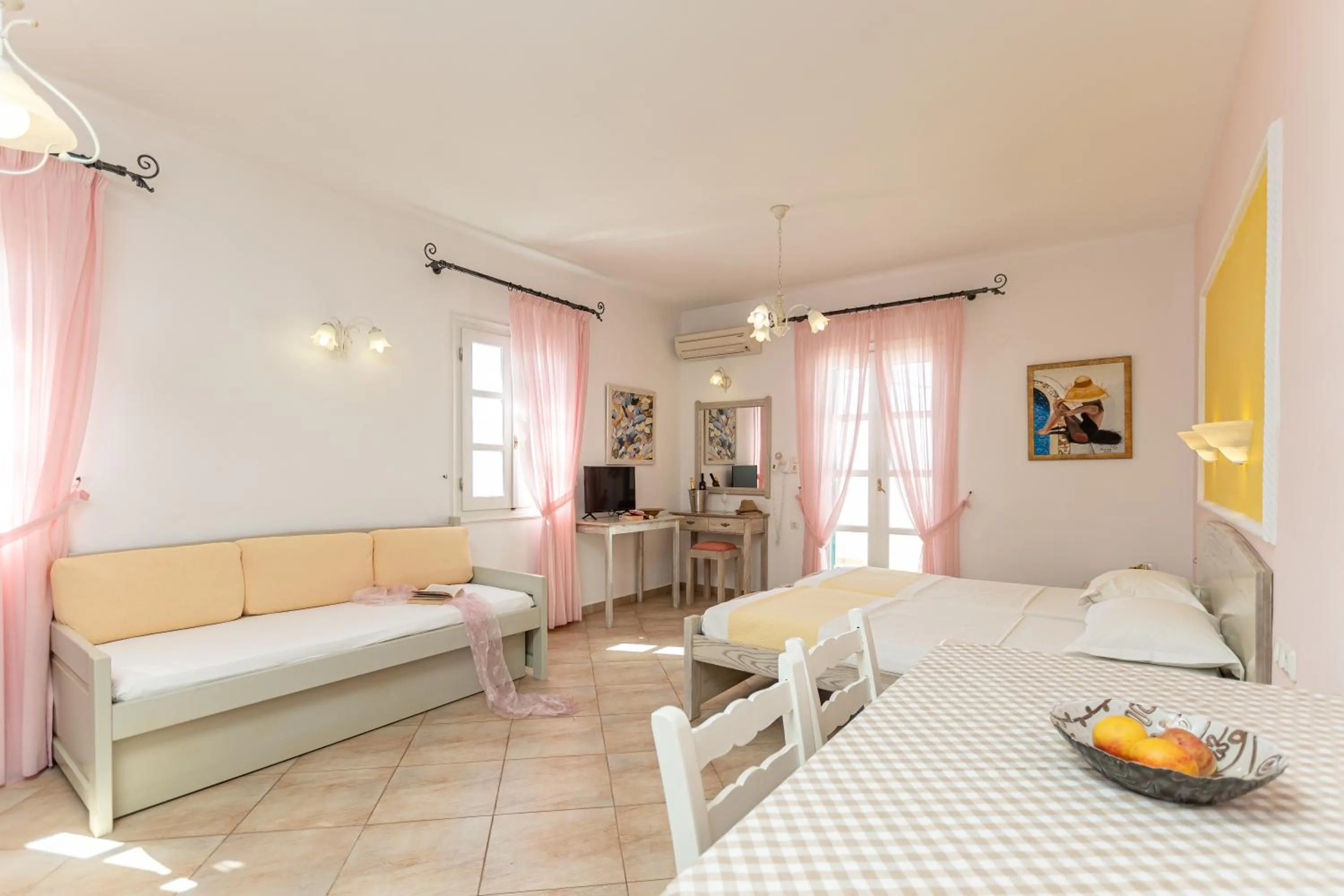 Bed in Annita's Village Hotel