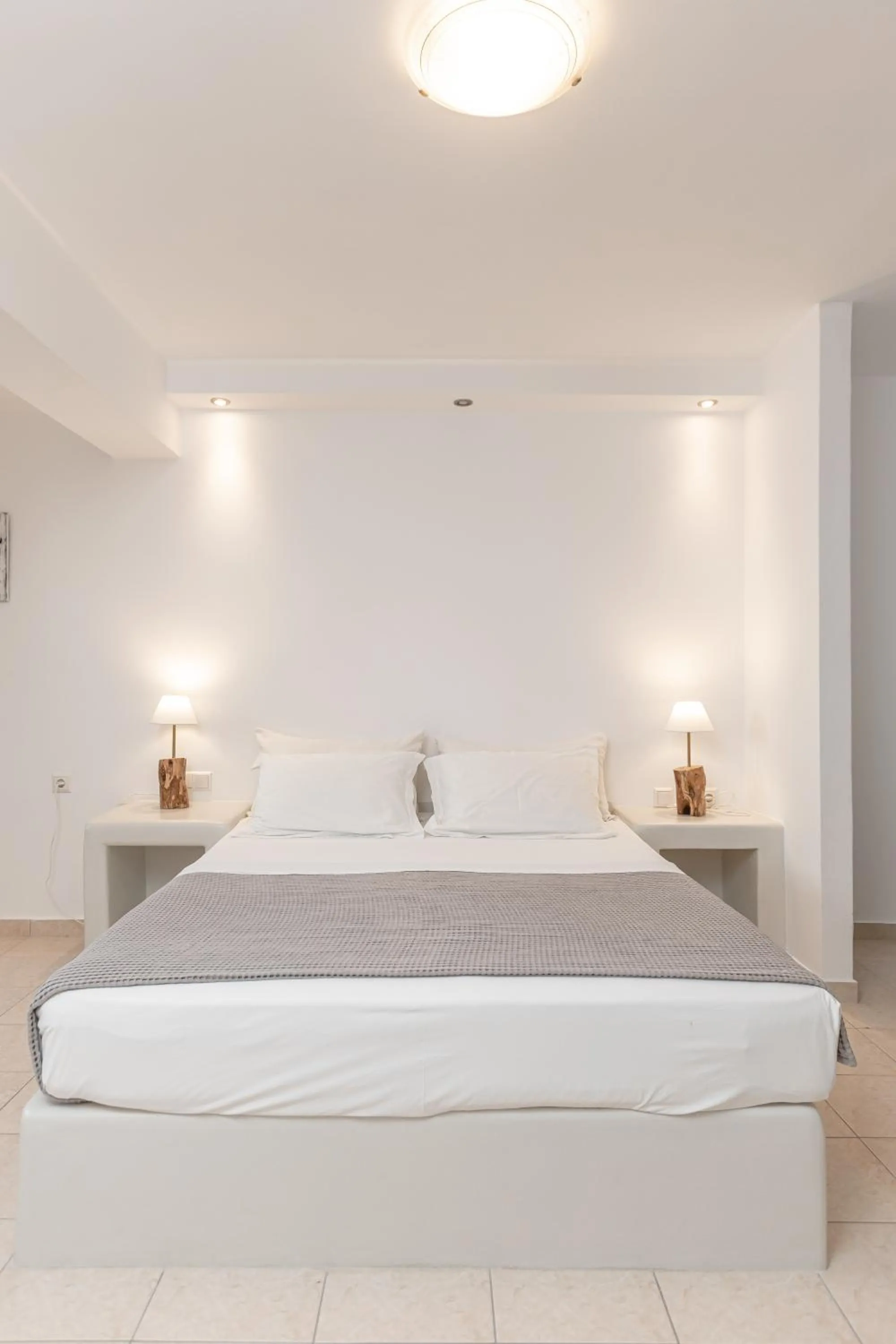 Bed in Annita's Village Hotel