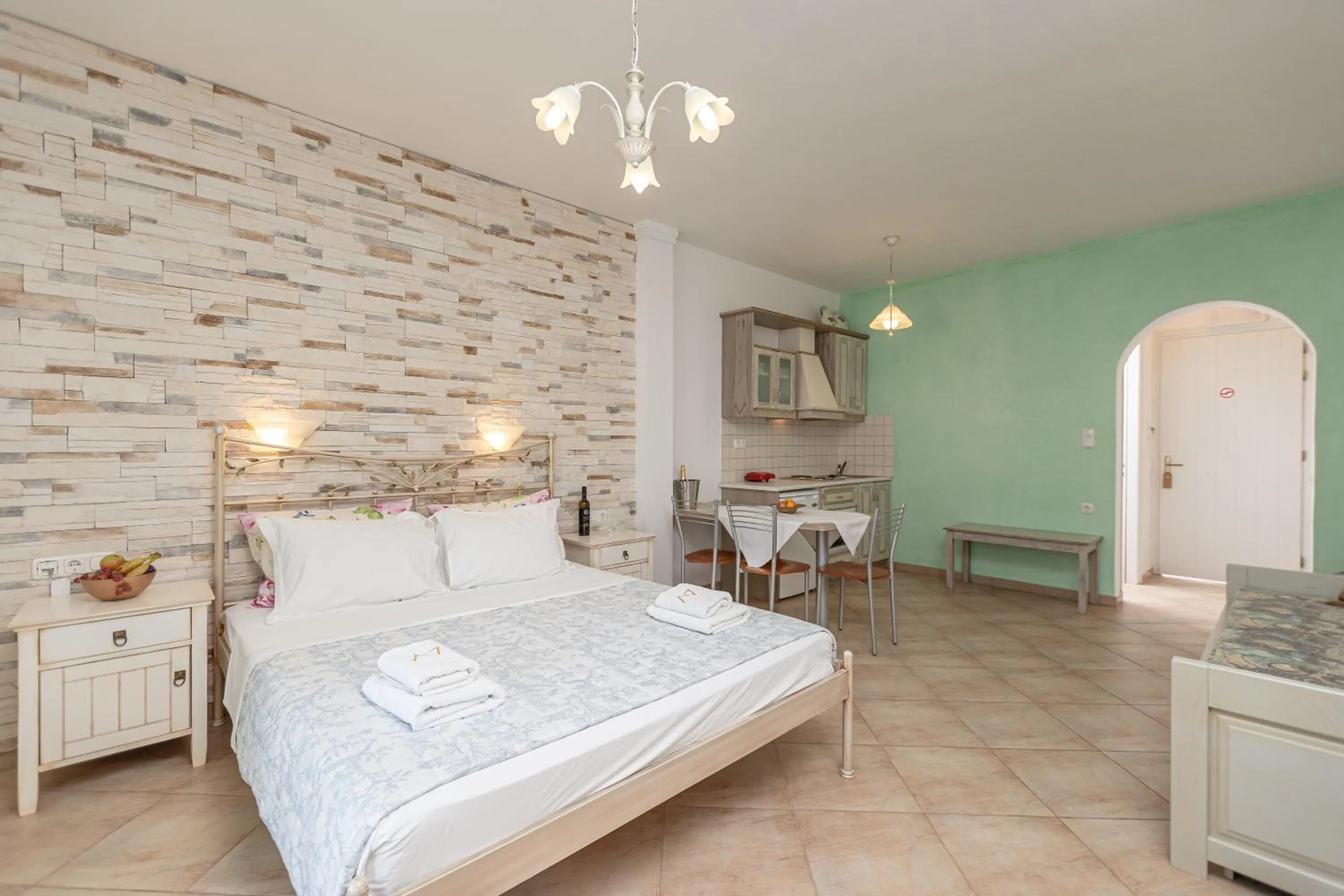 Bed in Annita's Village Hotel