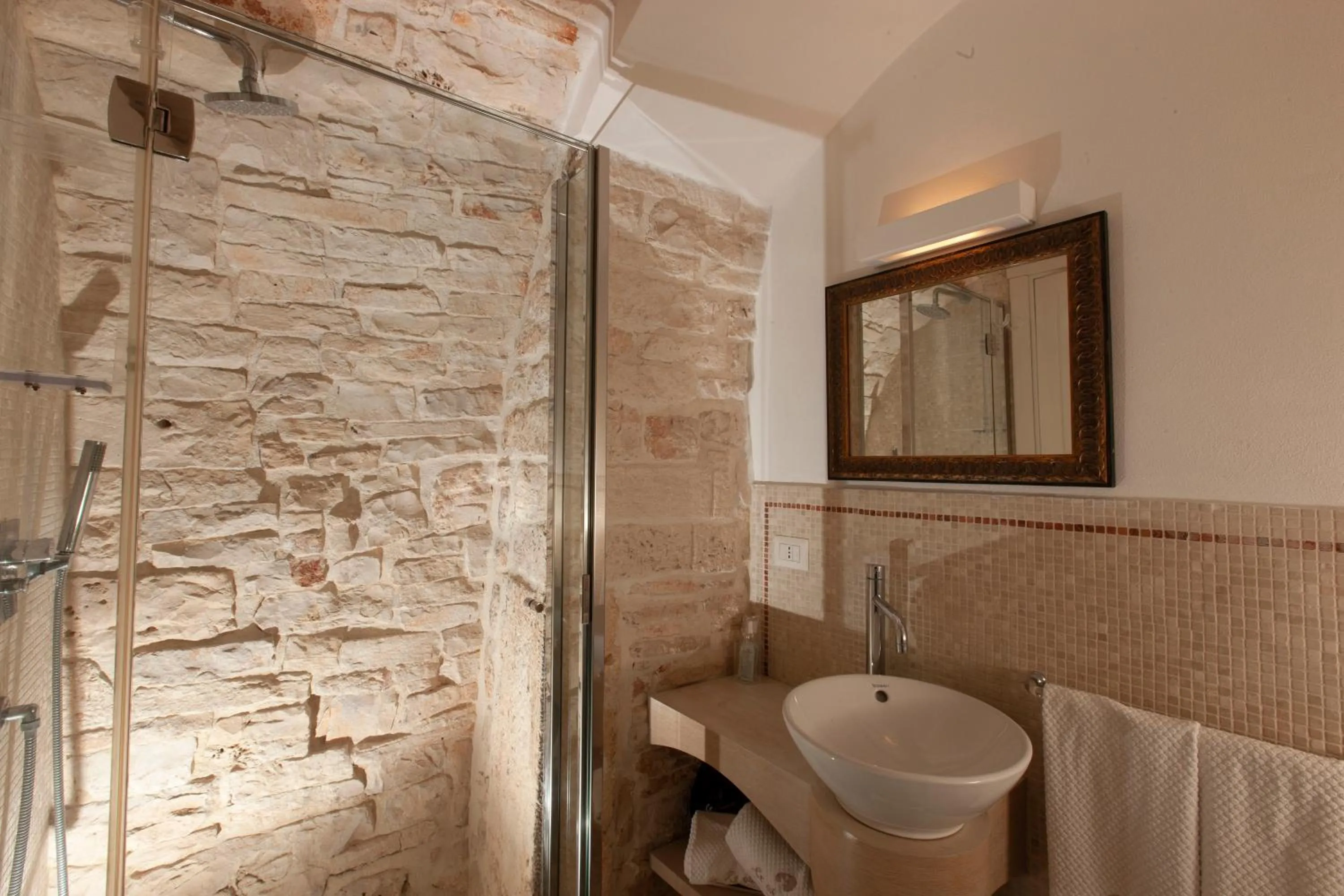 Shower in Le Alcove - Luxury Hotel nei Trulli