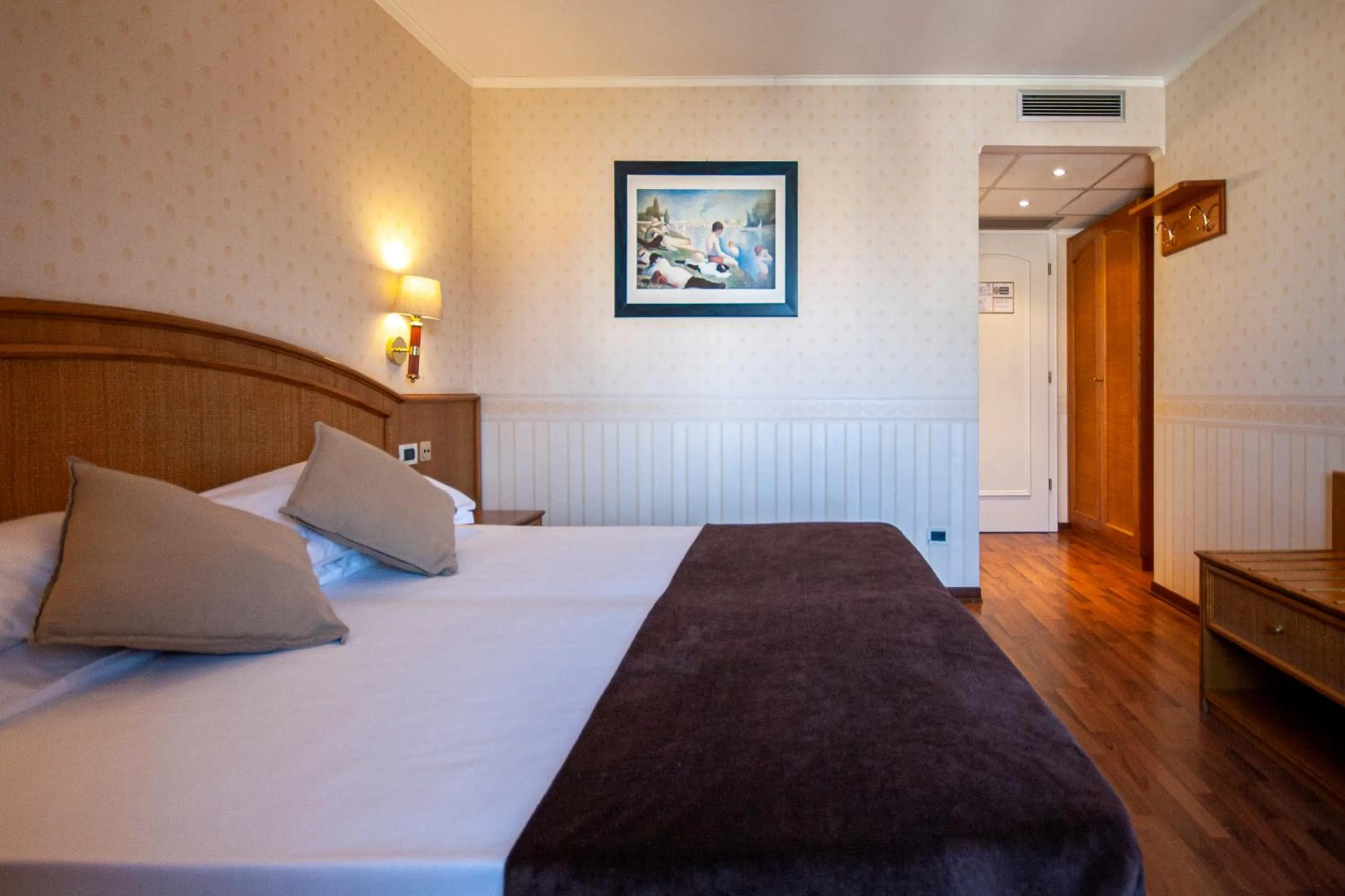 Bed in Hotel Metropole