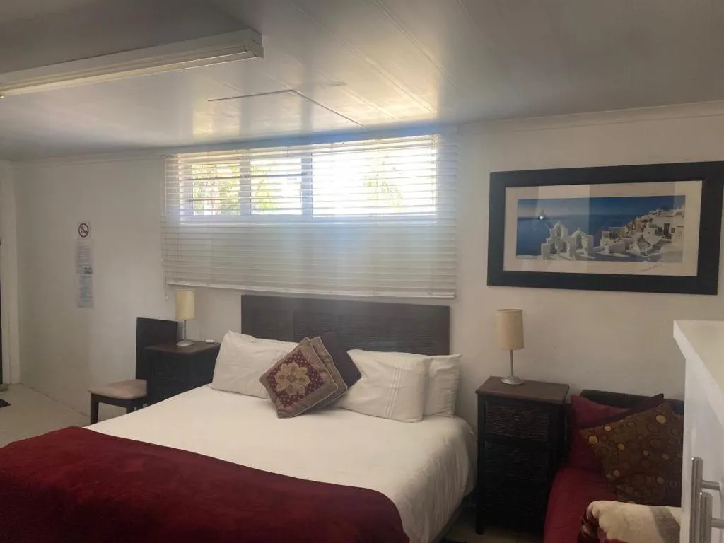 Bedroom, Bed in Au Plais De Langebaan at Palm Tree Villa