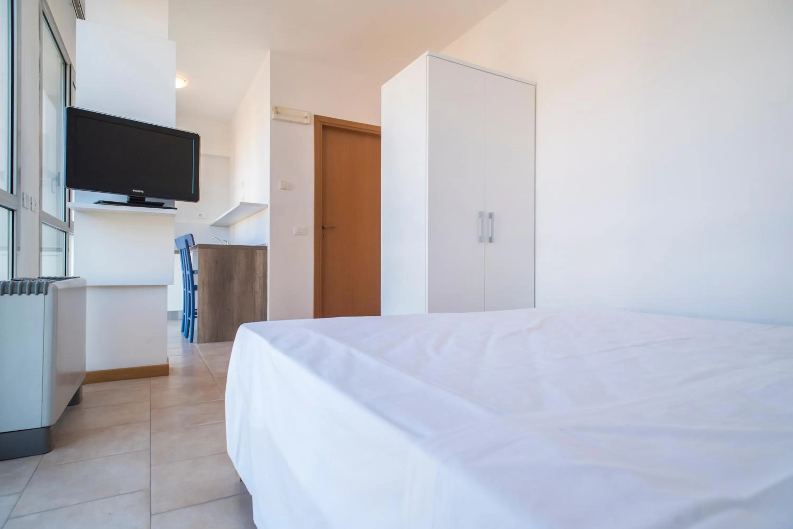 Living room, Bed in Darsena Ravenna Apartments