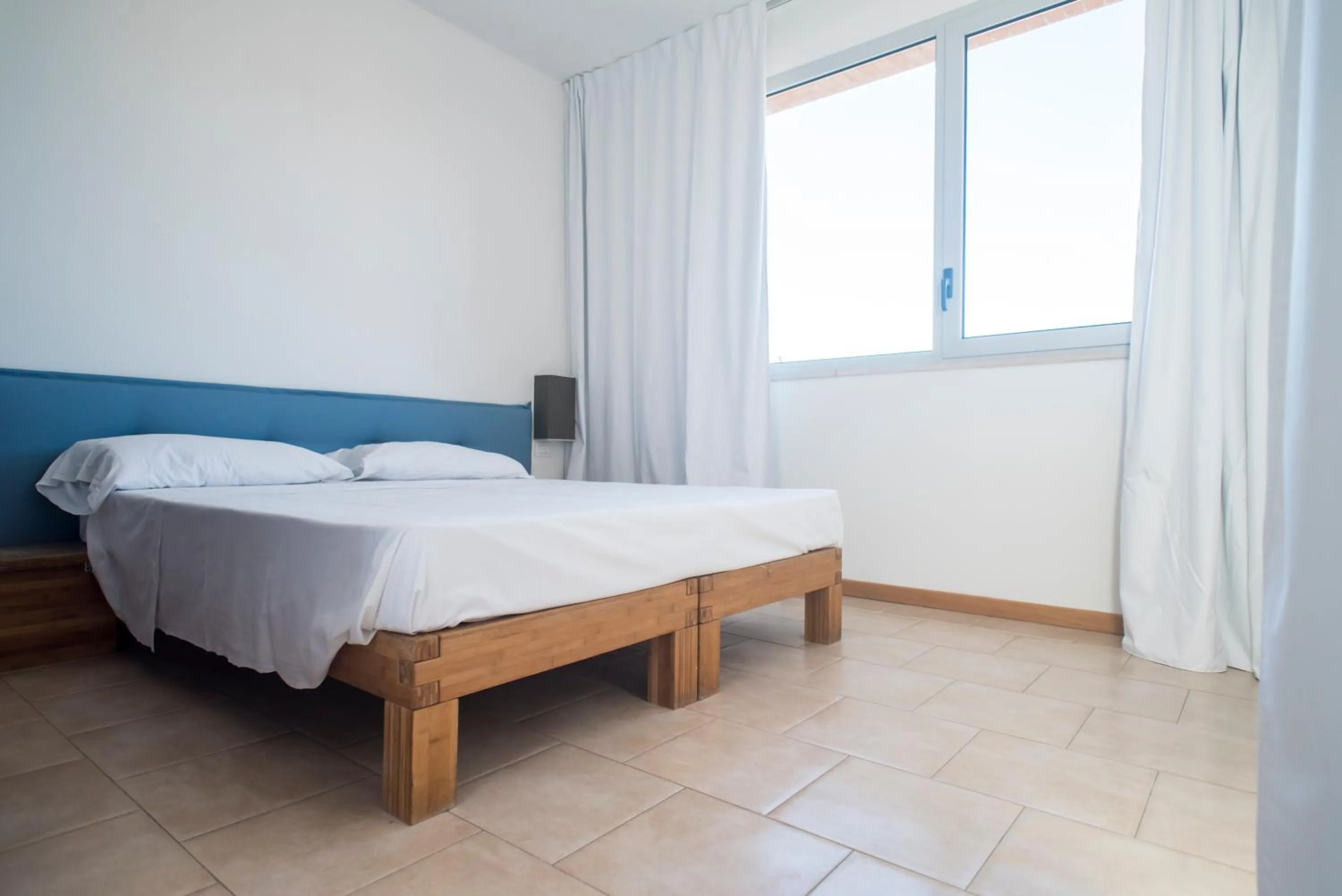 Bed in Darsena Ravenna Apartments