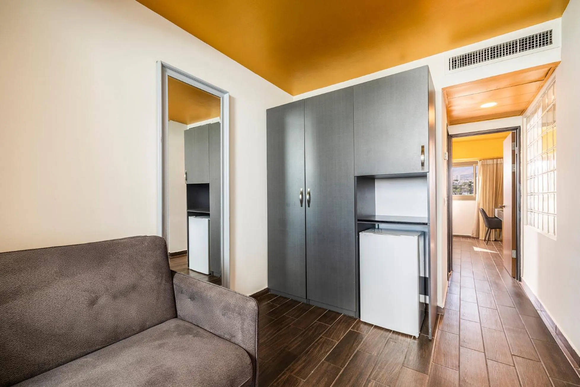 Kitchen or kitchenette in EVE Eilat by Adam Hotels