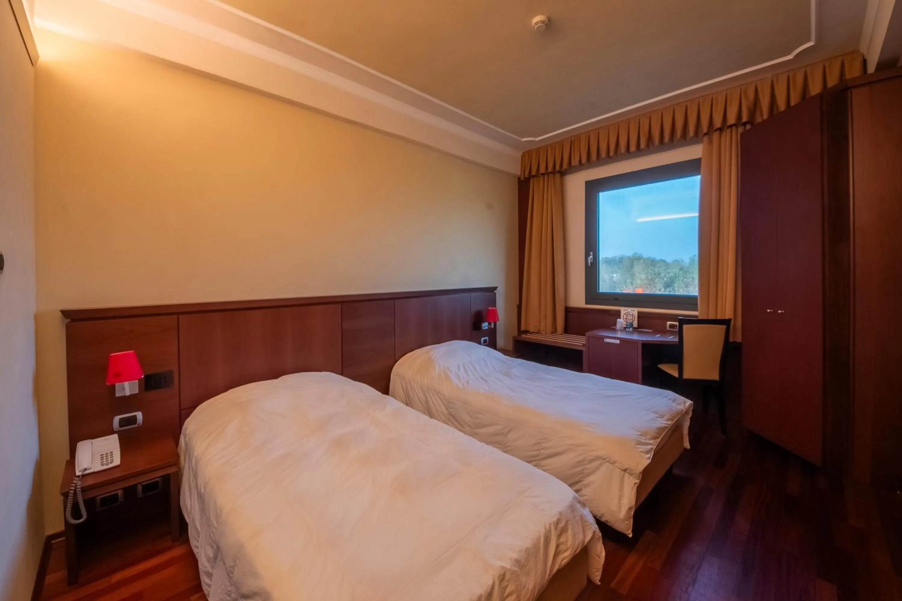 Bed in Dado Hotel International