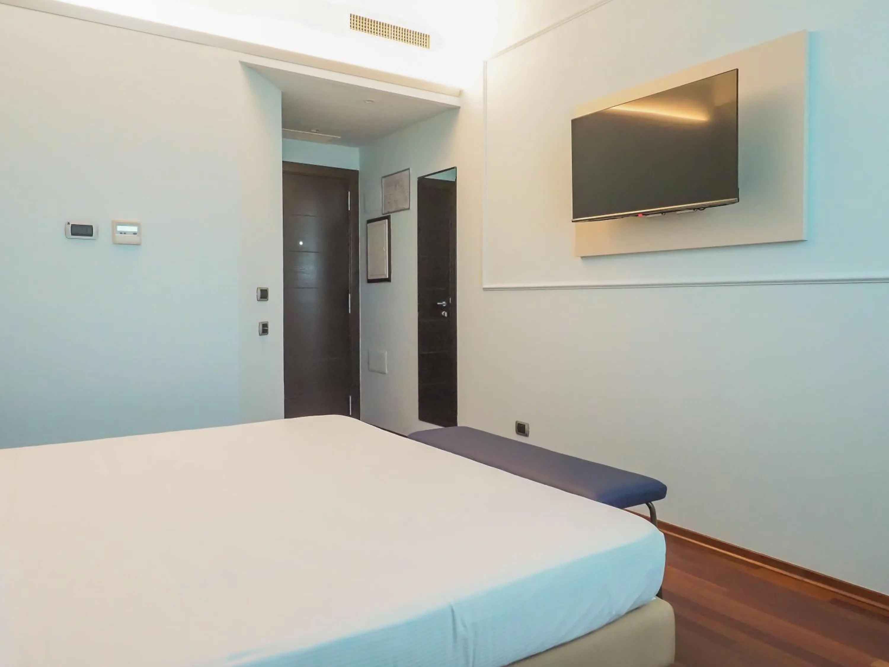 Bed in Dado Hotel International