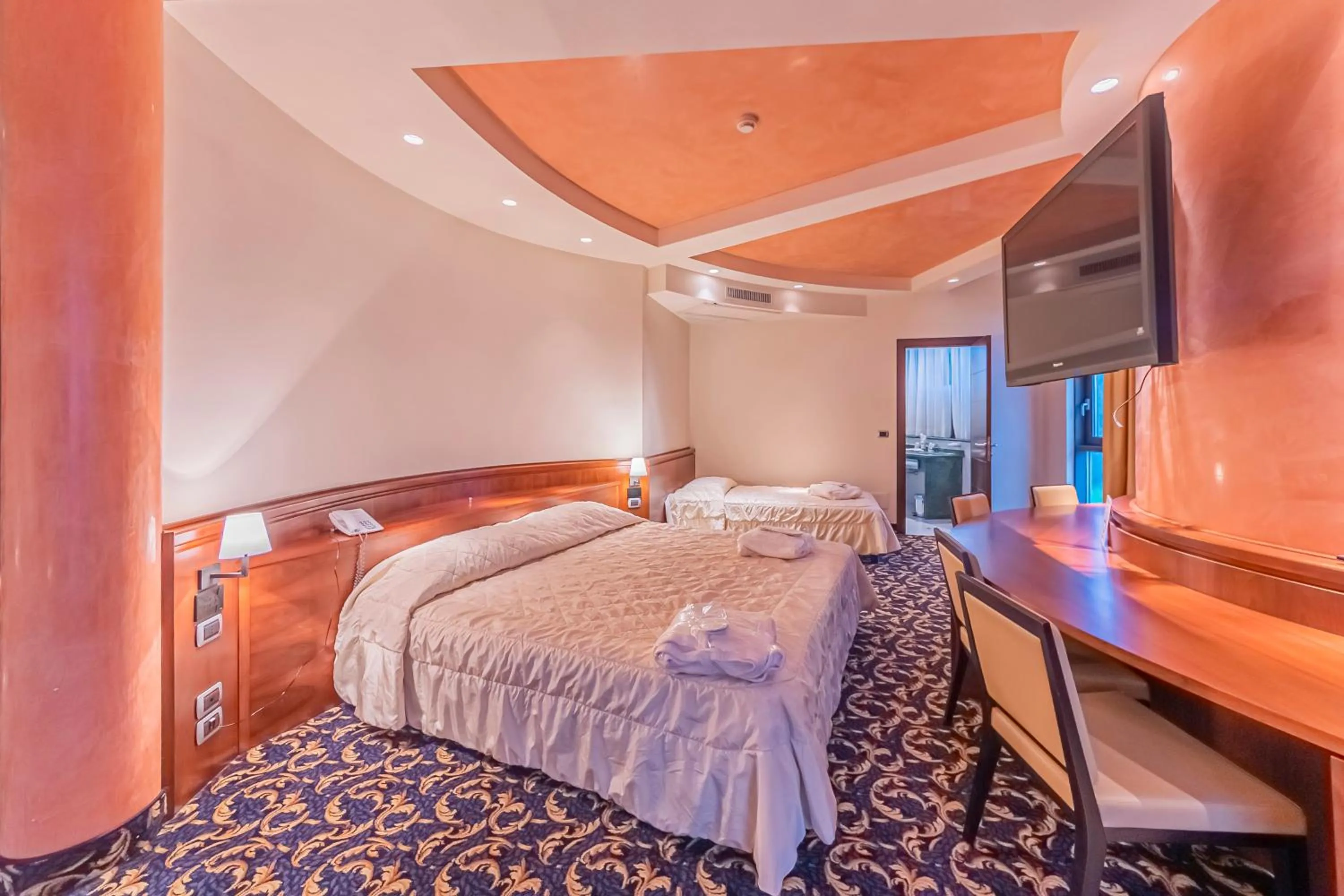 Bed in Dado Hotel International