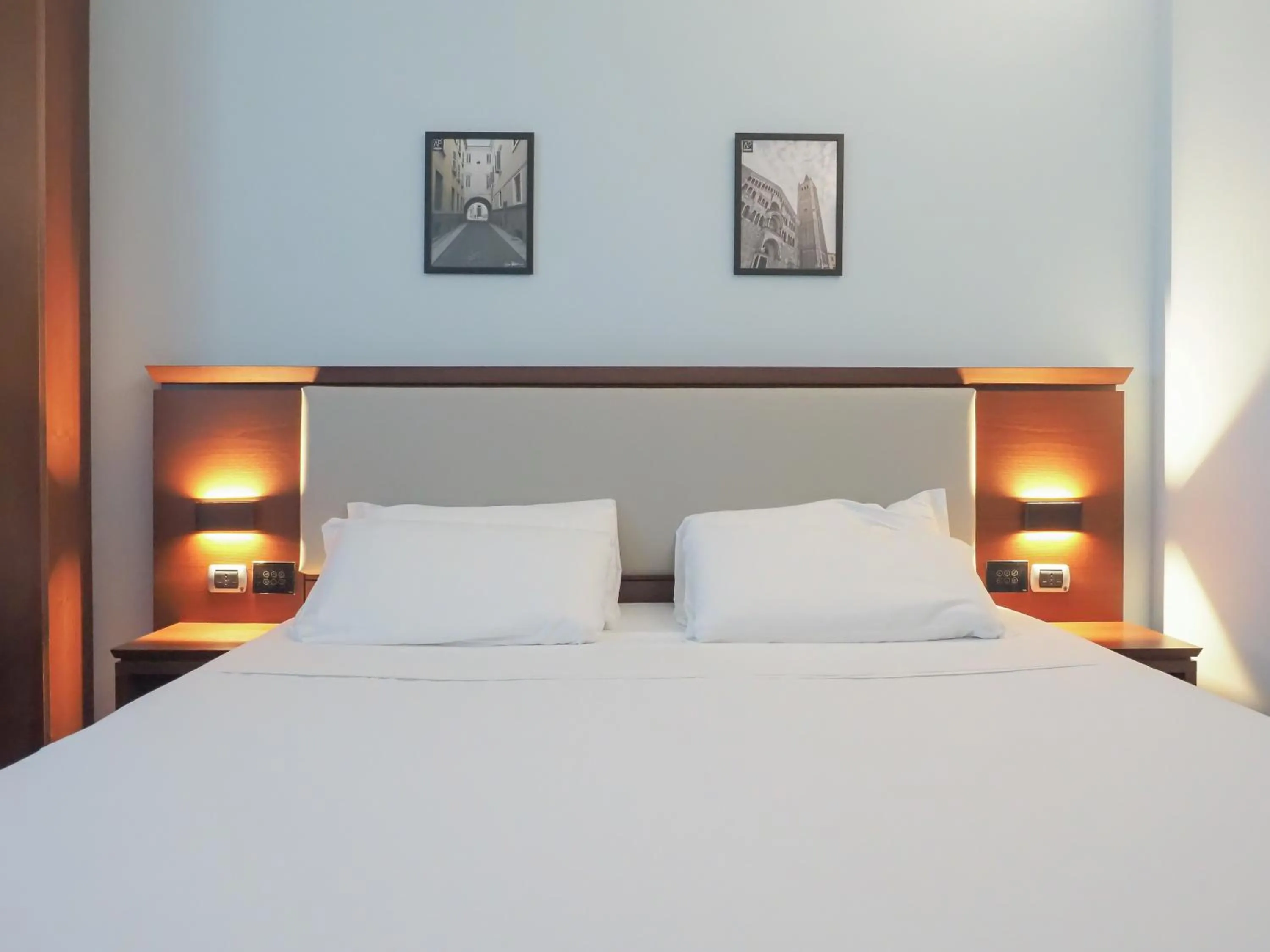 Bed in Dado Hotel International