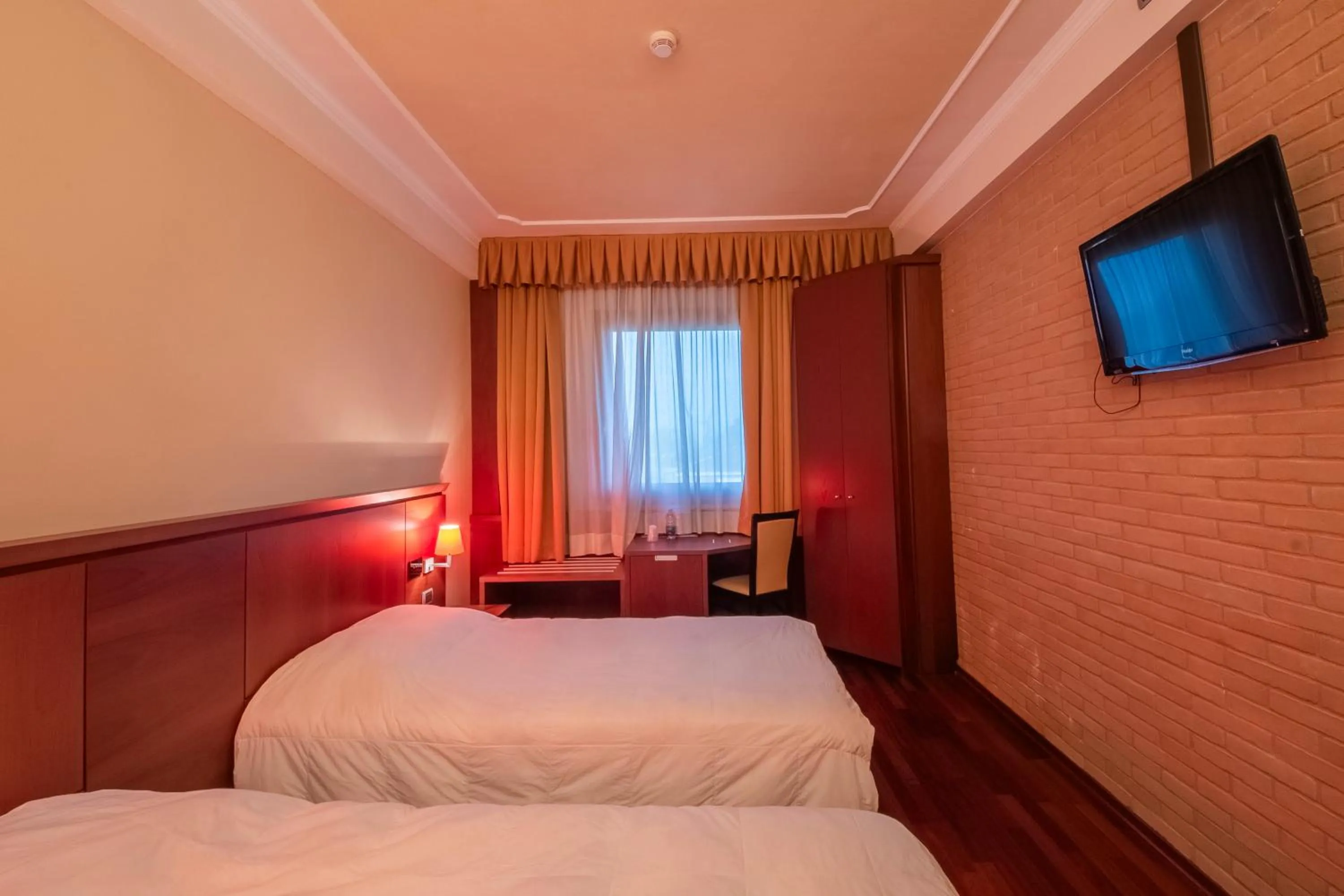 Bed in Dado Hotel International