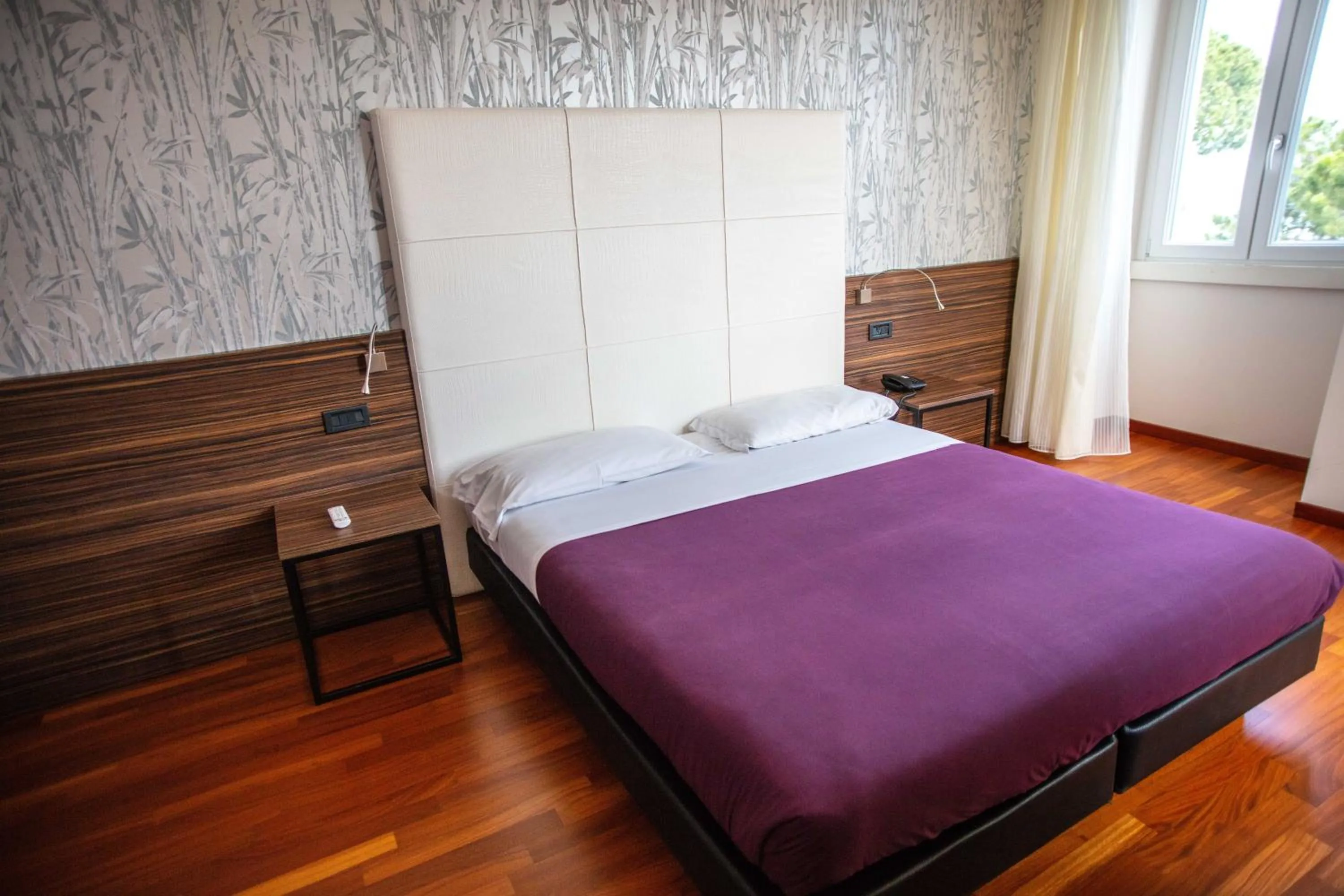Bed in Hotel Vittorio