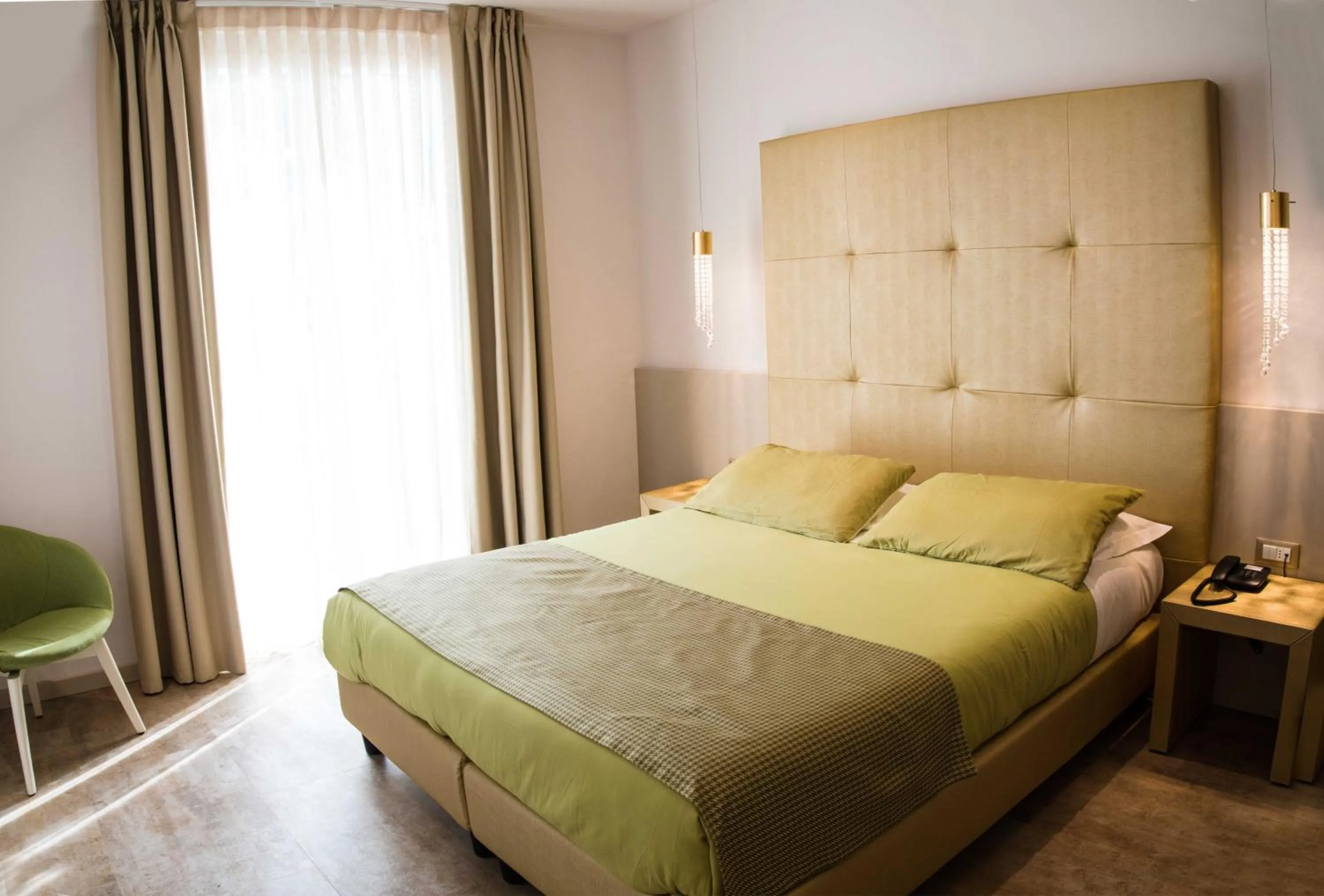 Bed in Hotel Vittorio