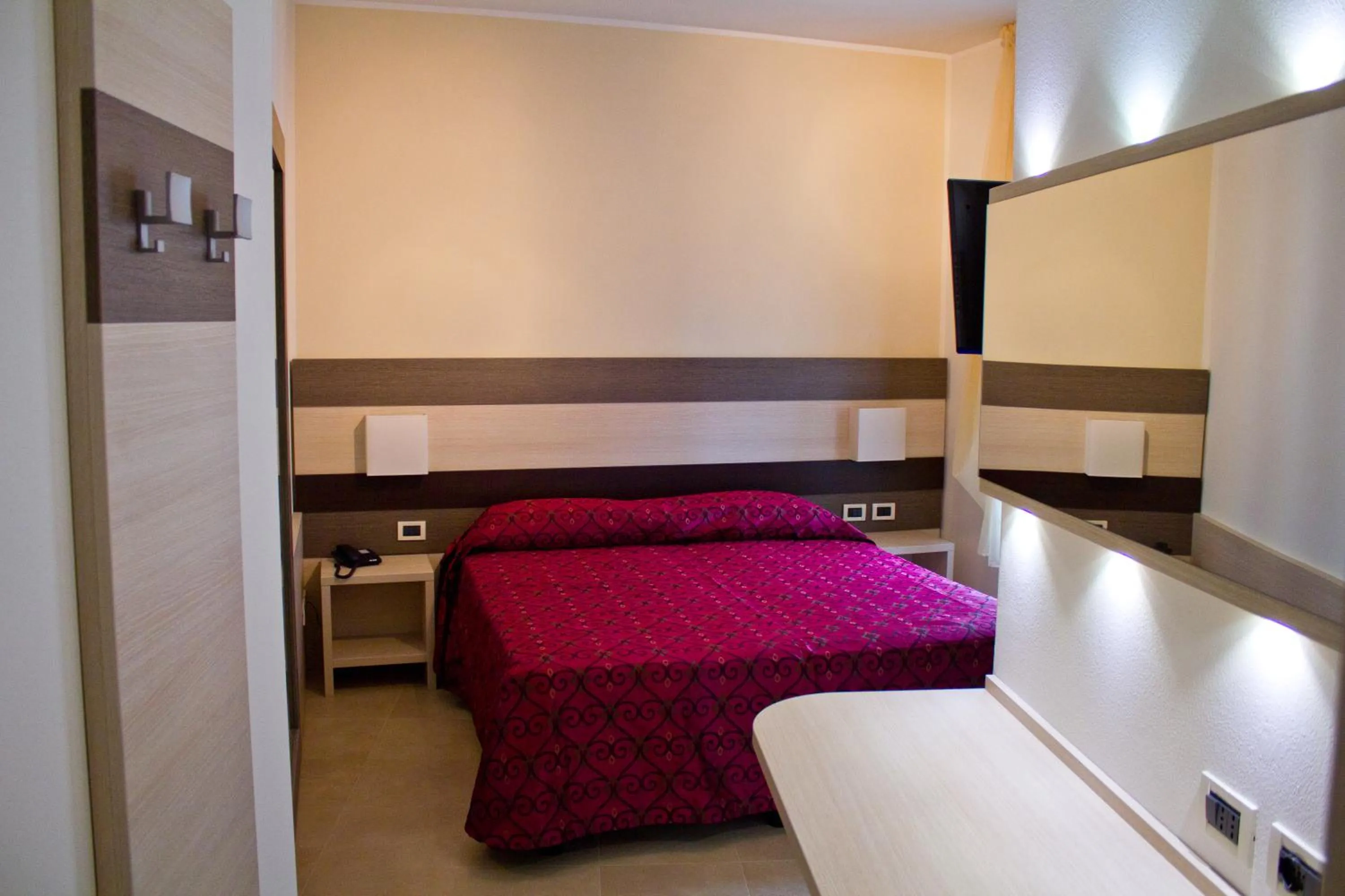 Photo of the whole room, Bed in Hotel Siena