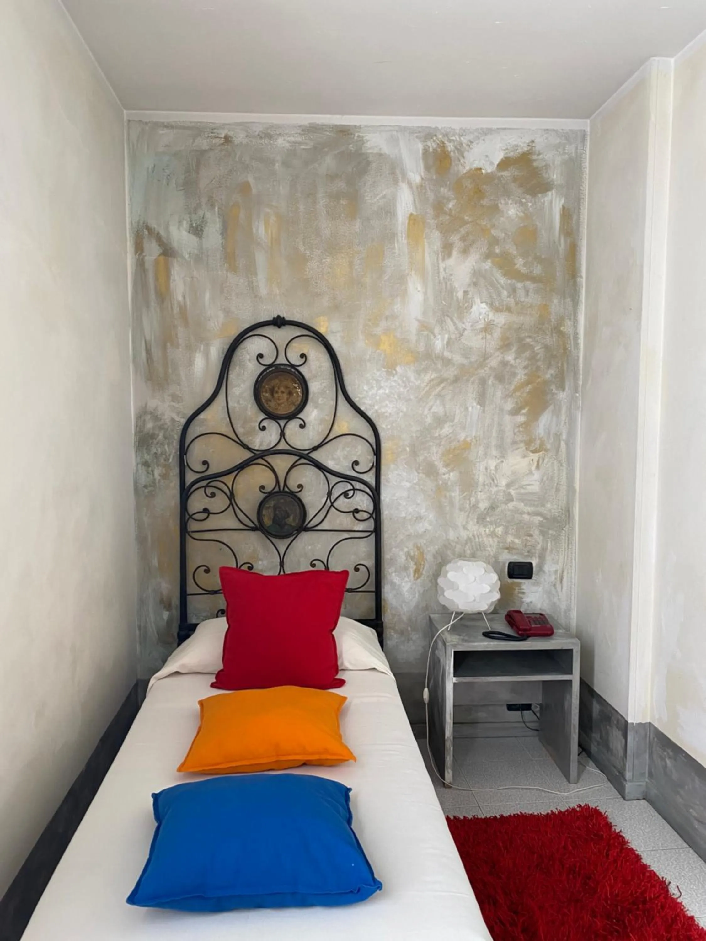 Bed in Art Hotel Al Fagiano