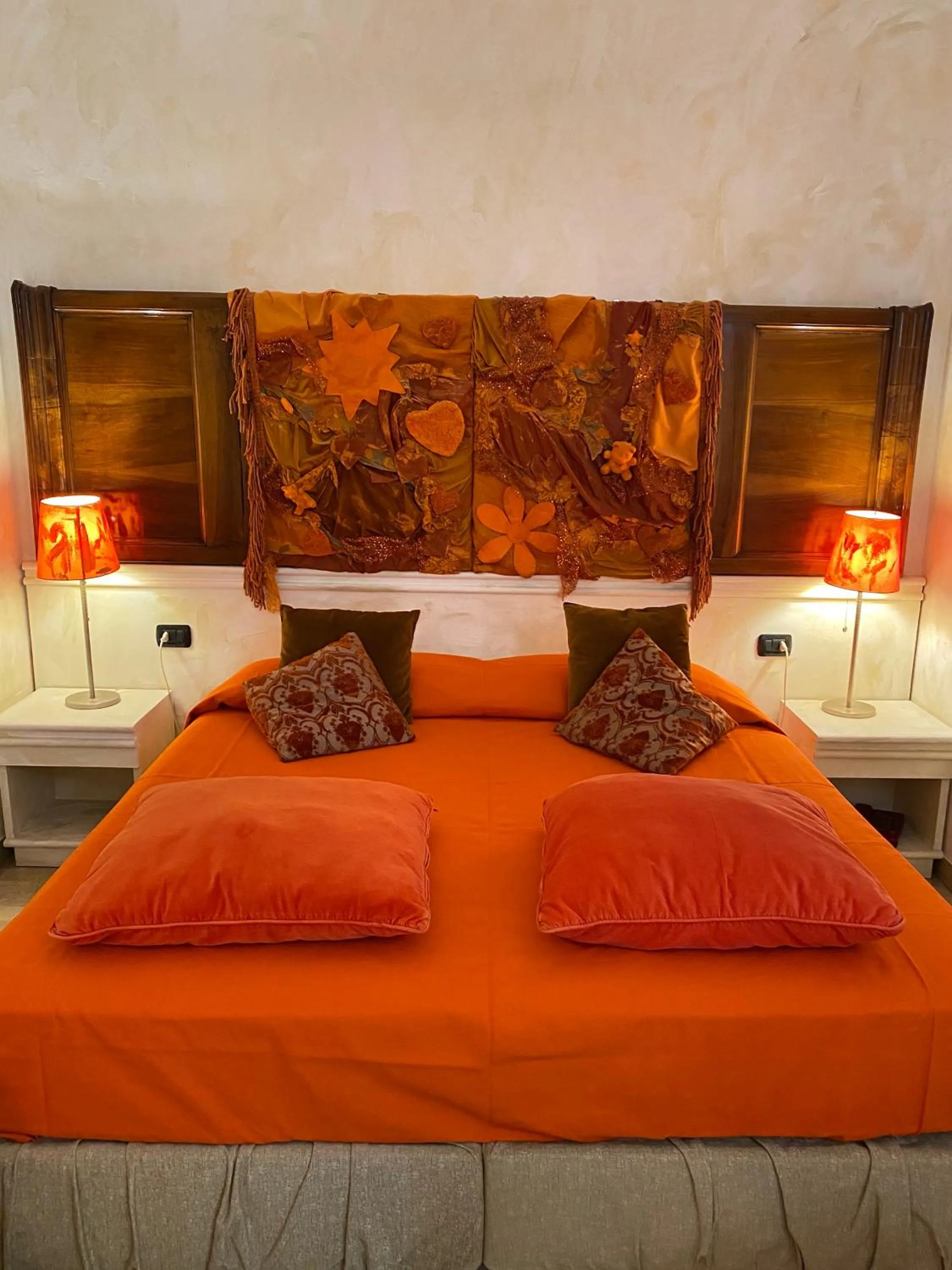 Bed in Art Hotel Al Fagiano