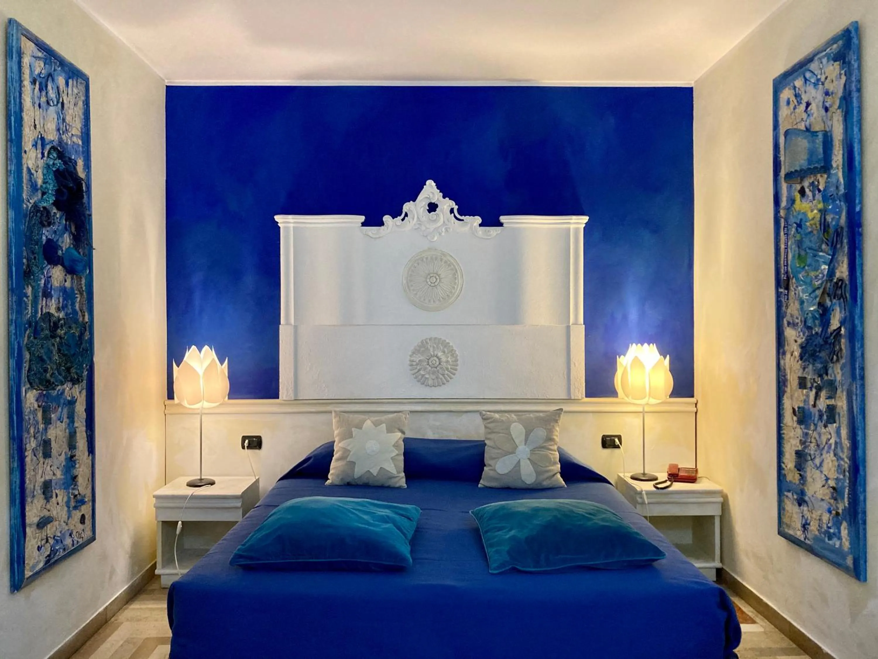 Bed in Art Hotel Al Fagiano