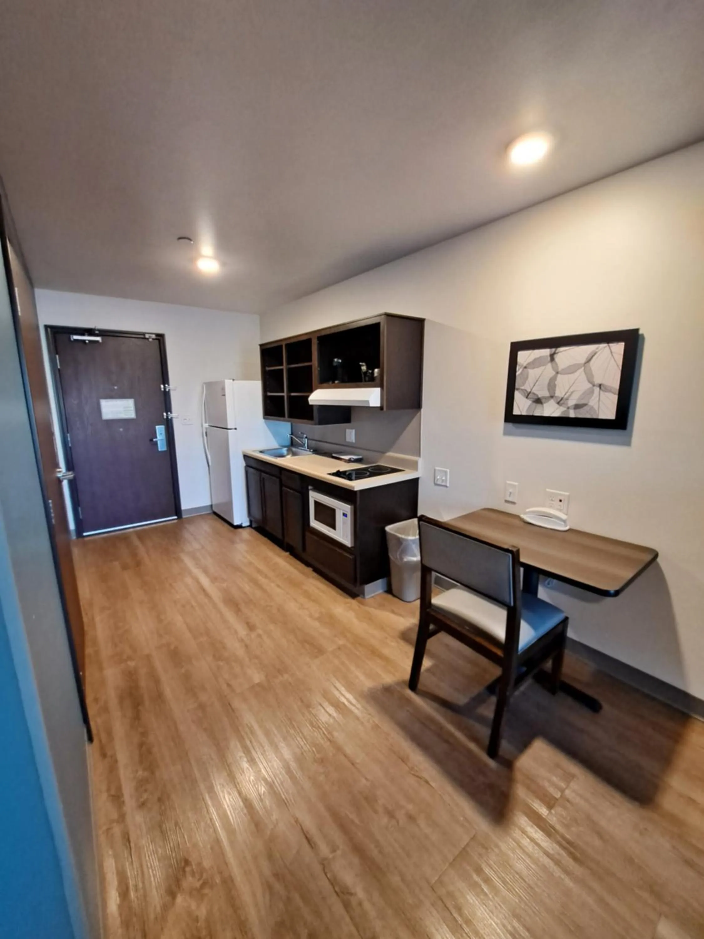 Kitchen or kitchenette in WoodSpring Suites Fargo North Near NDSU