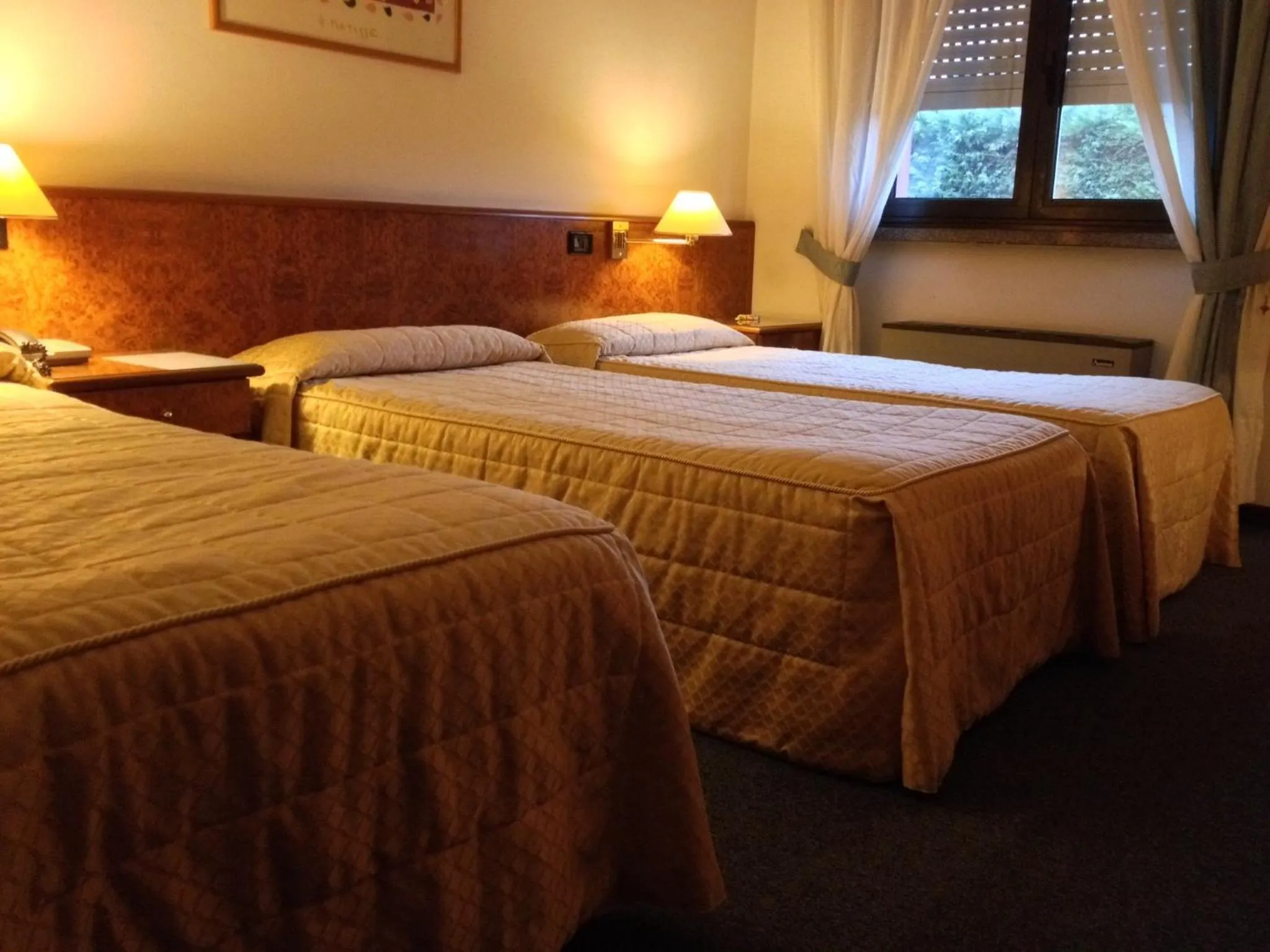 Bed in Hotel Motel Europa