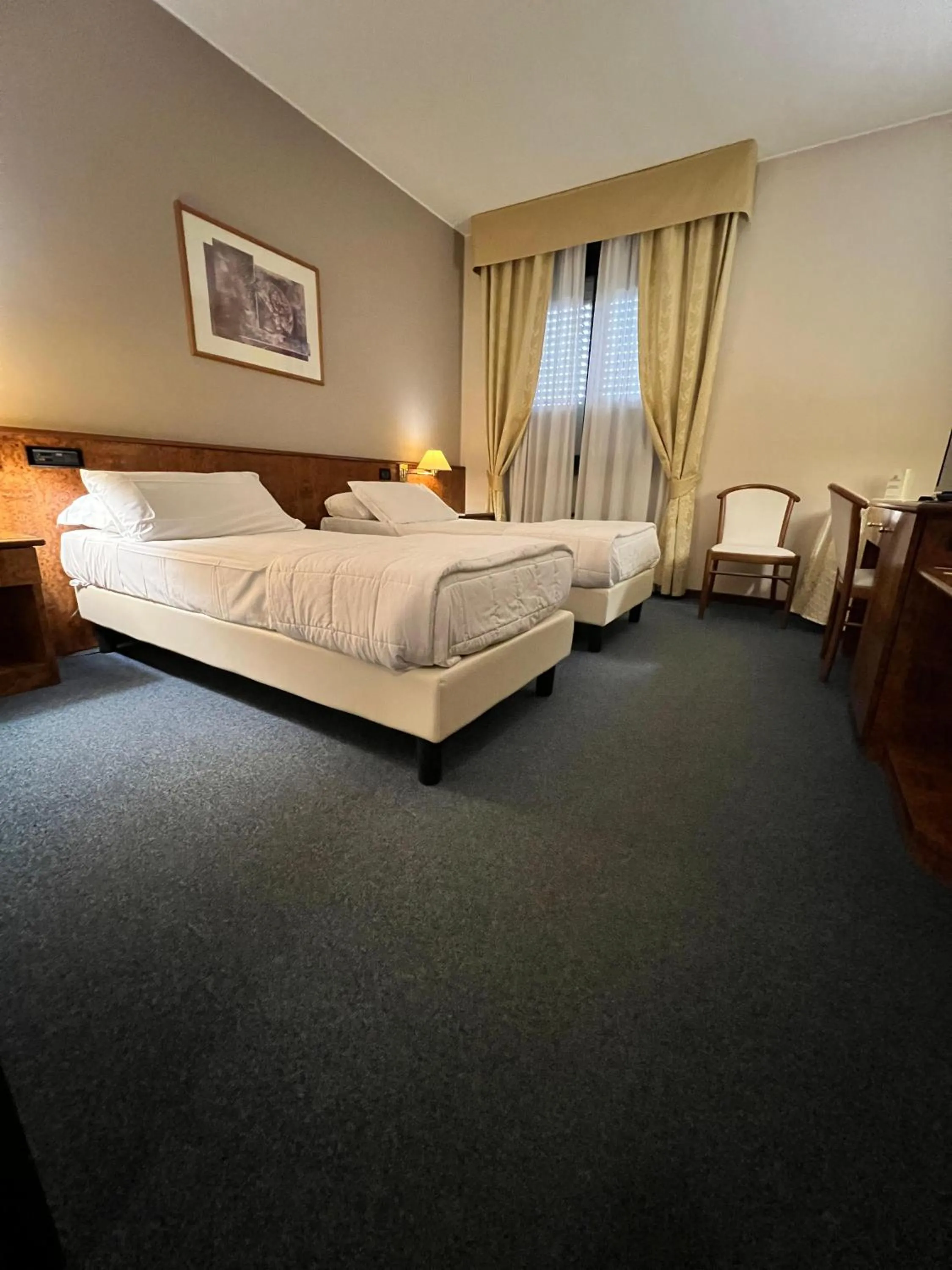 Bed in Hotel Motel Europa