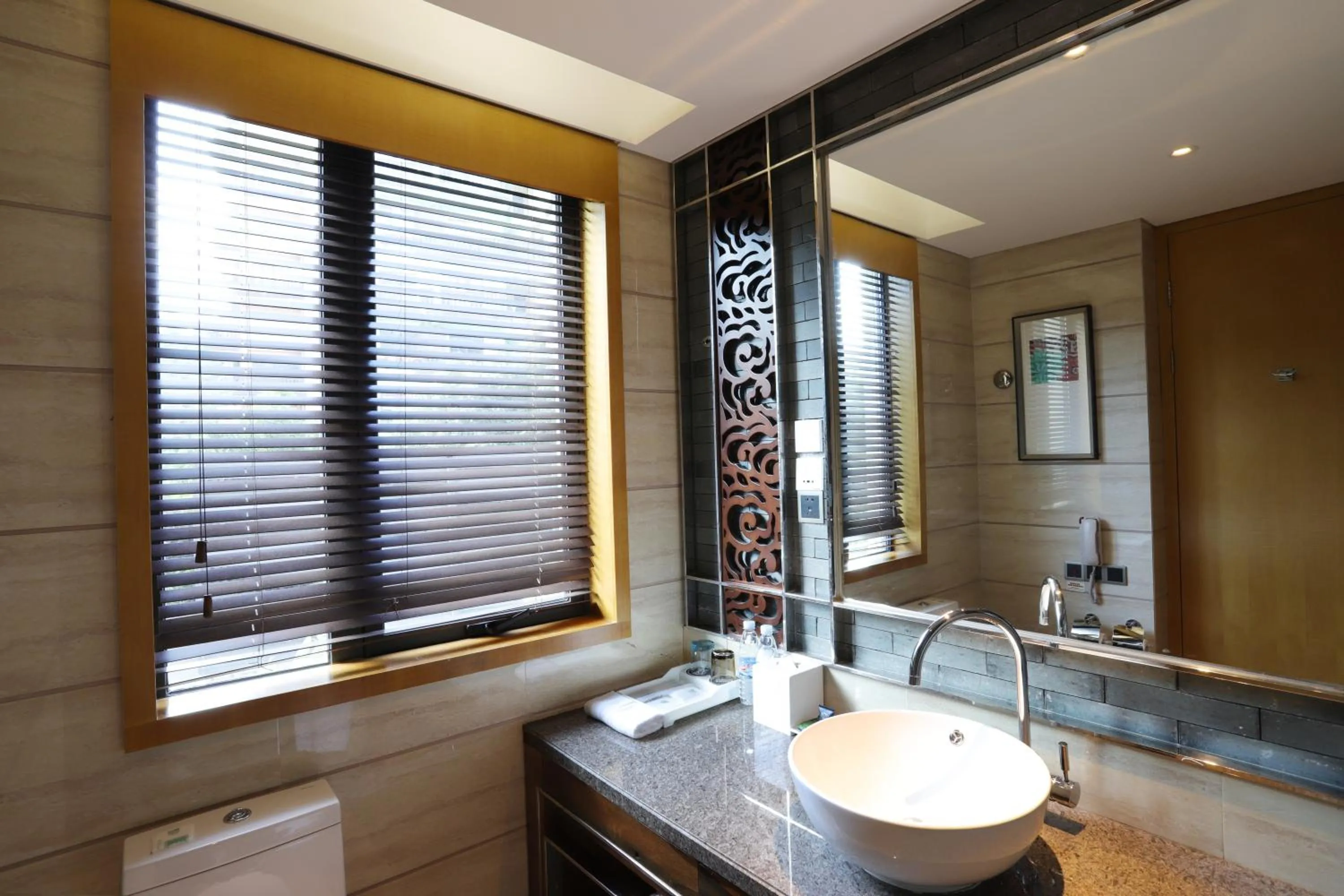 Toilet in Four Points by Sheraton Heyuan Resort